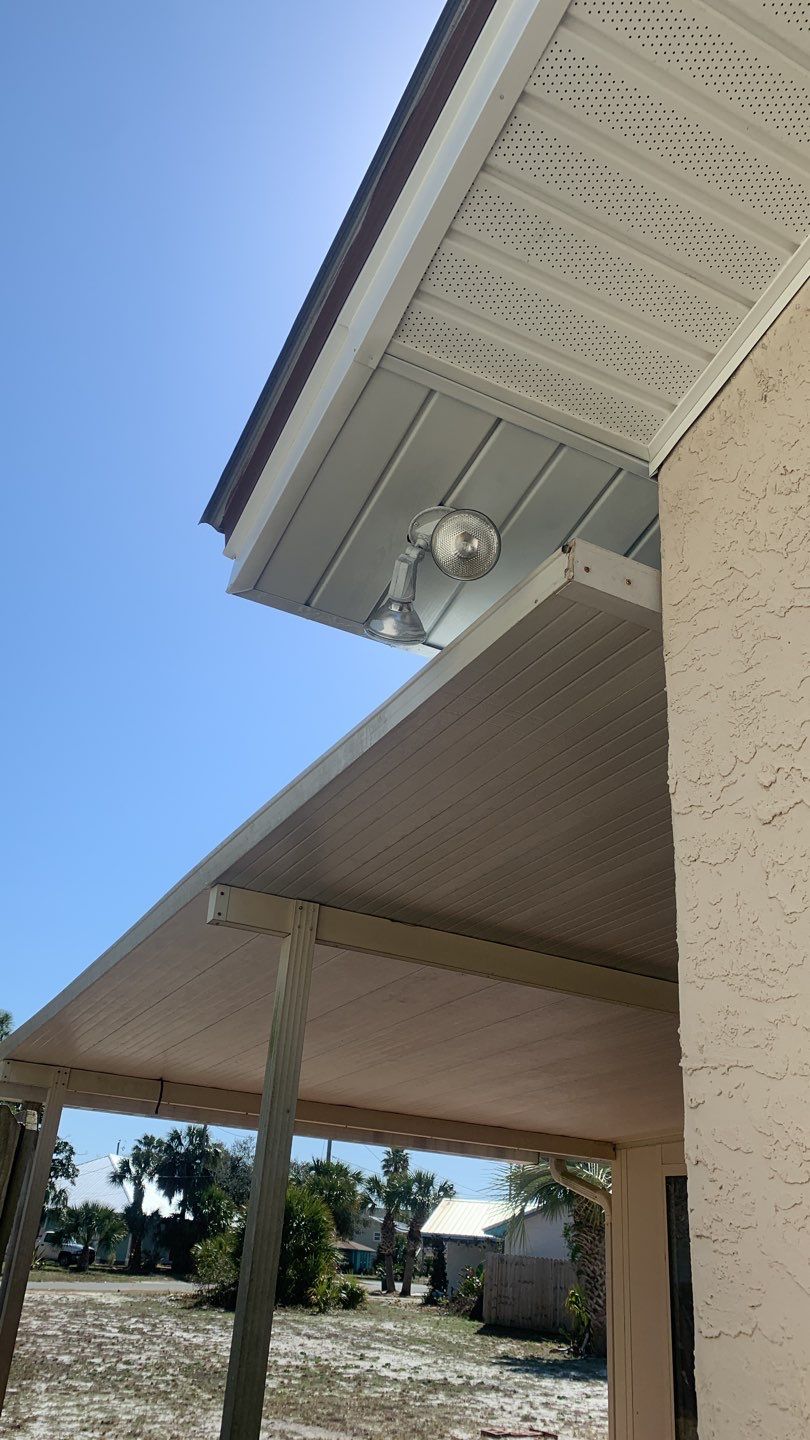 Soffit and Fascia Installation Using White Vinyl Soffit and Musket Brown Fascia by Gutter Professors