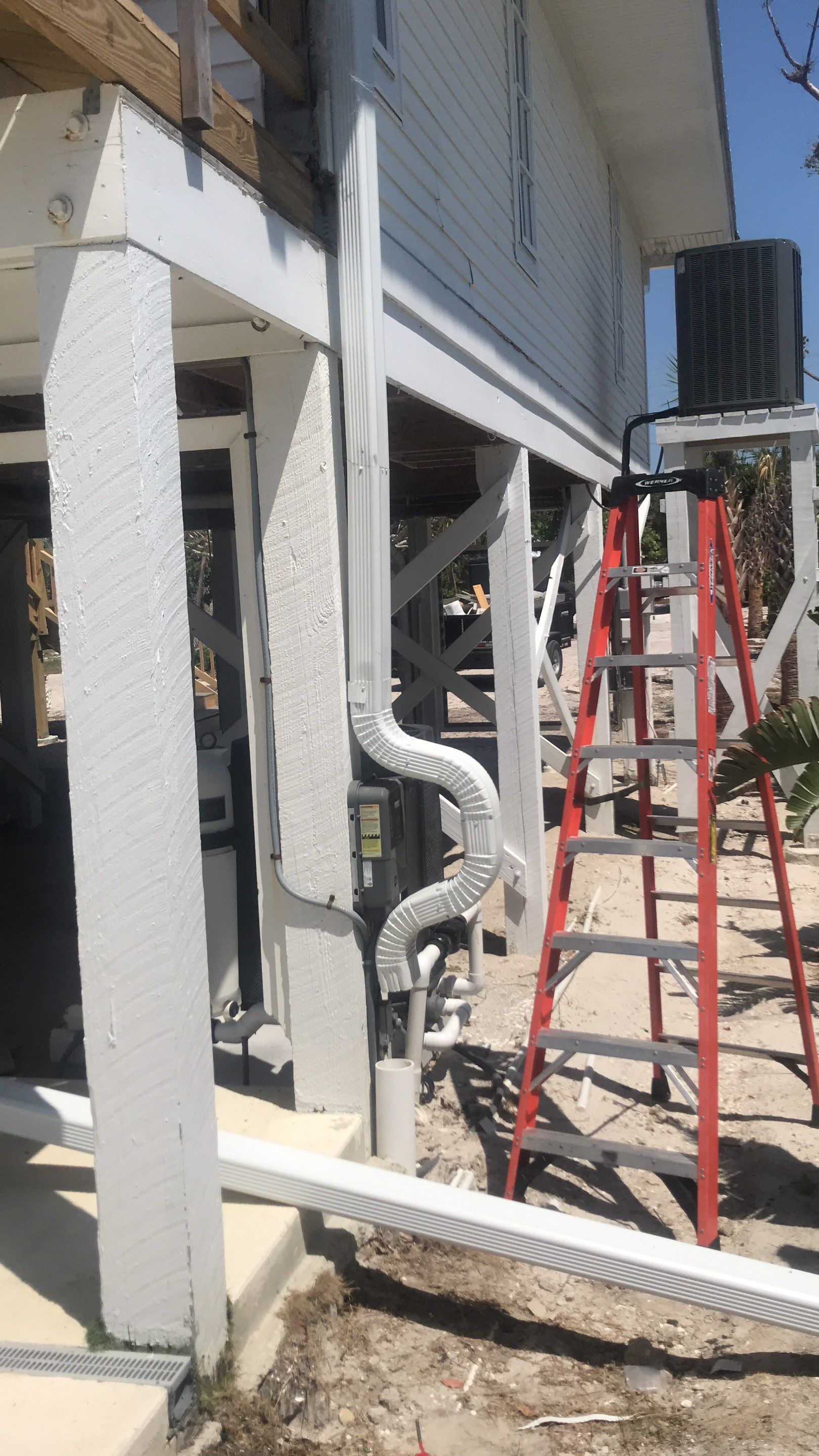 Downspout Installation using Downspout Extension in Sanibel FL by Gutter Professors