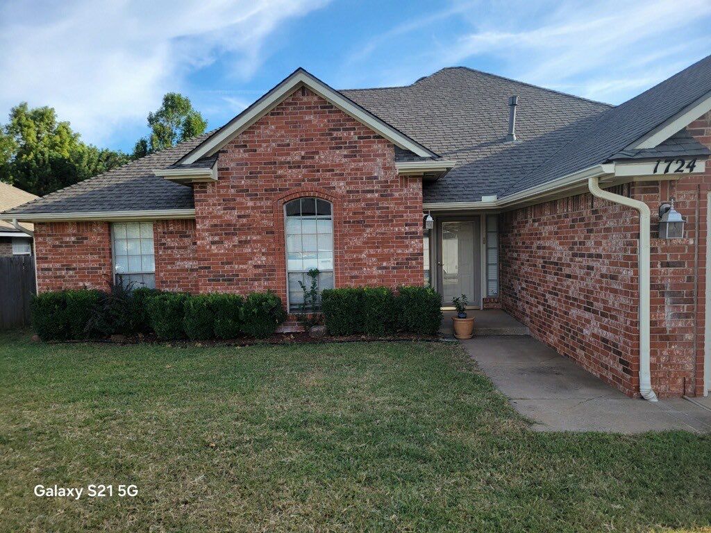 Roof Replacement and Gutter Installment in Edmond, OK by McCann's Roofing and Construction