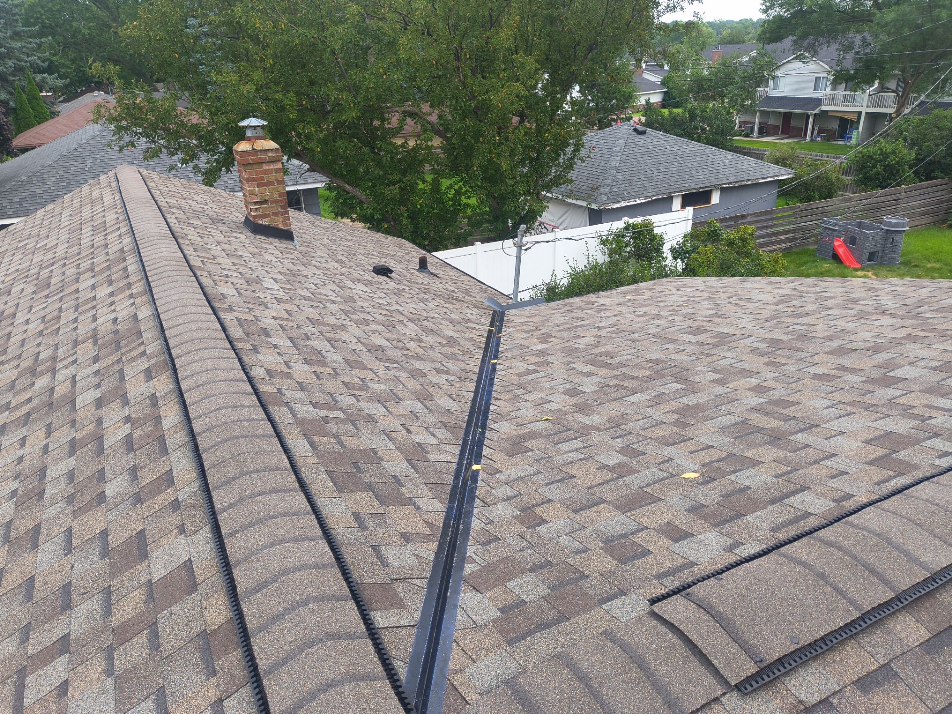Owens Corning TruDefinition Roof Replacement with Gutters | Roseville, MN by Next Level Seamless Gutters / Exteriors Inc.