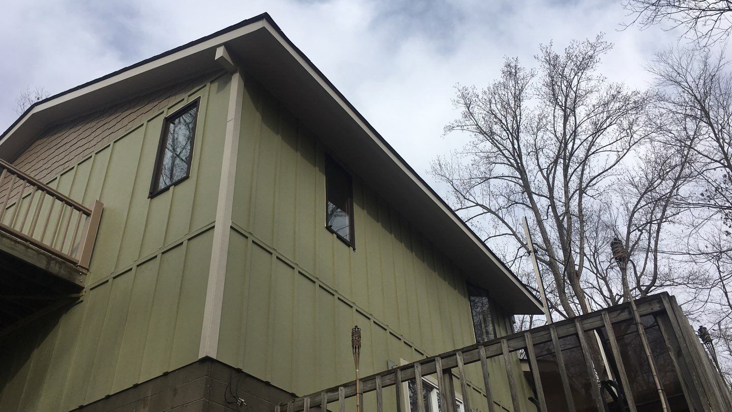 Siding Replacement by American Home Contractors