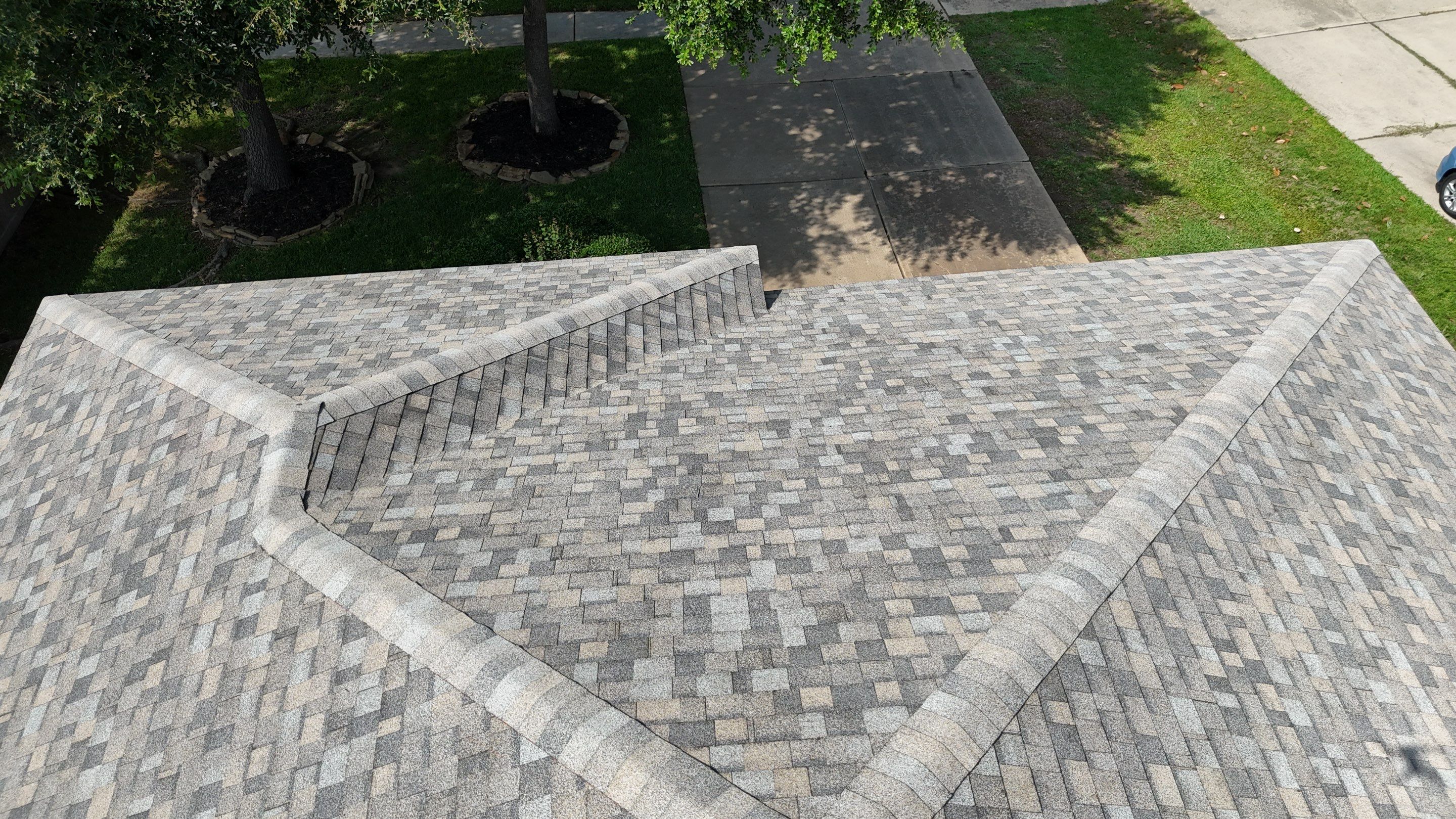 Residential Roofing & Gutter Installation using IKO Dynasty by Core Four Roofing