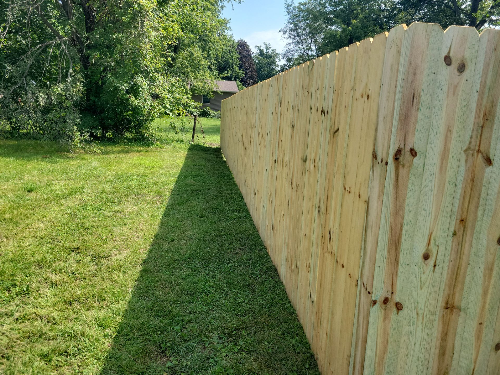 Treated Pine Privacy and Picket Fence Installation in Evansdale by Perfect Picket Fence and Stain