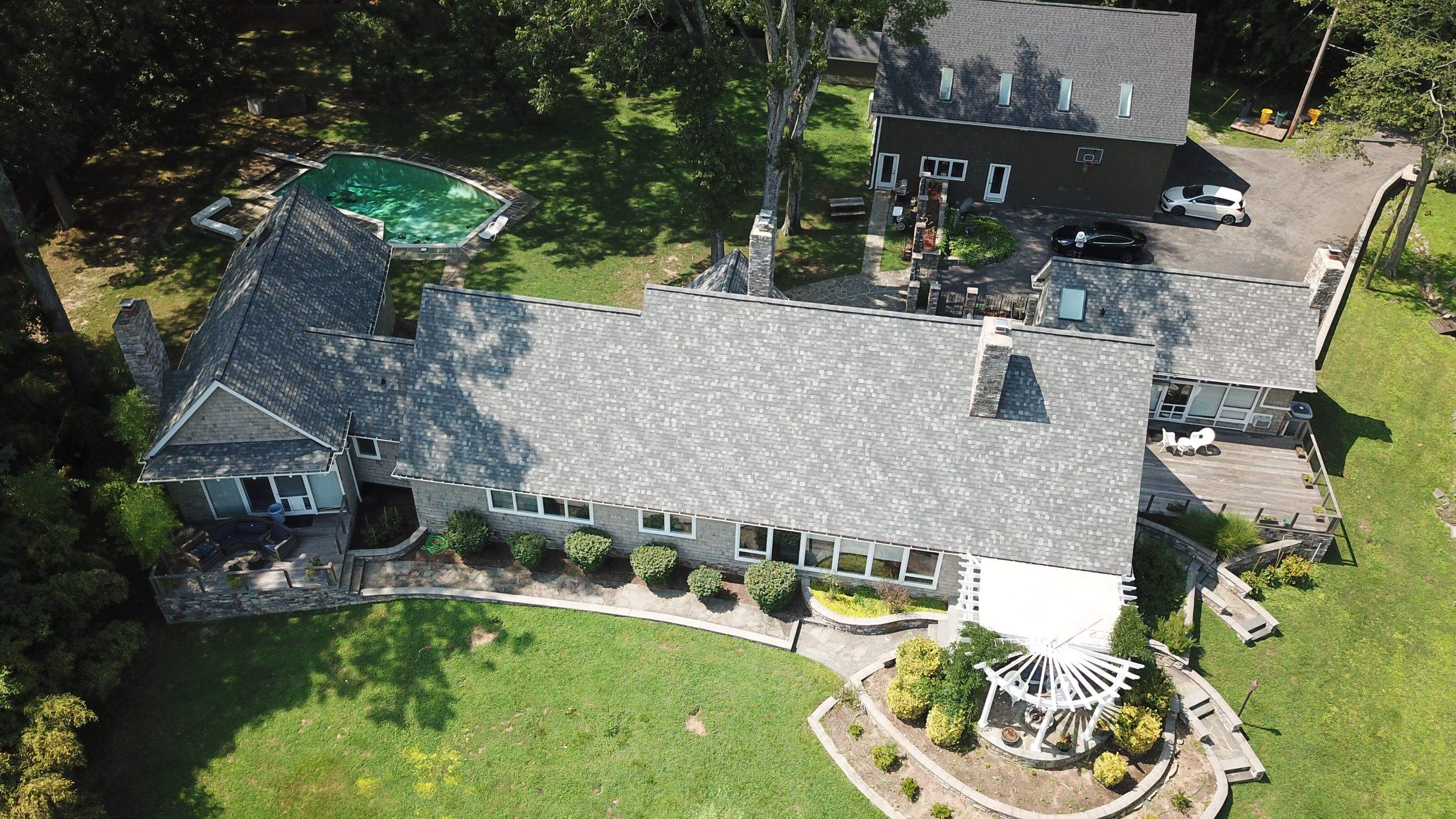 Roof Replacement using IKO Dynasty by American Home Contractors