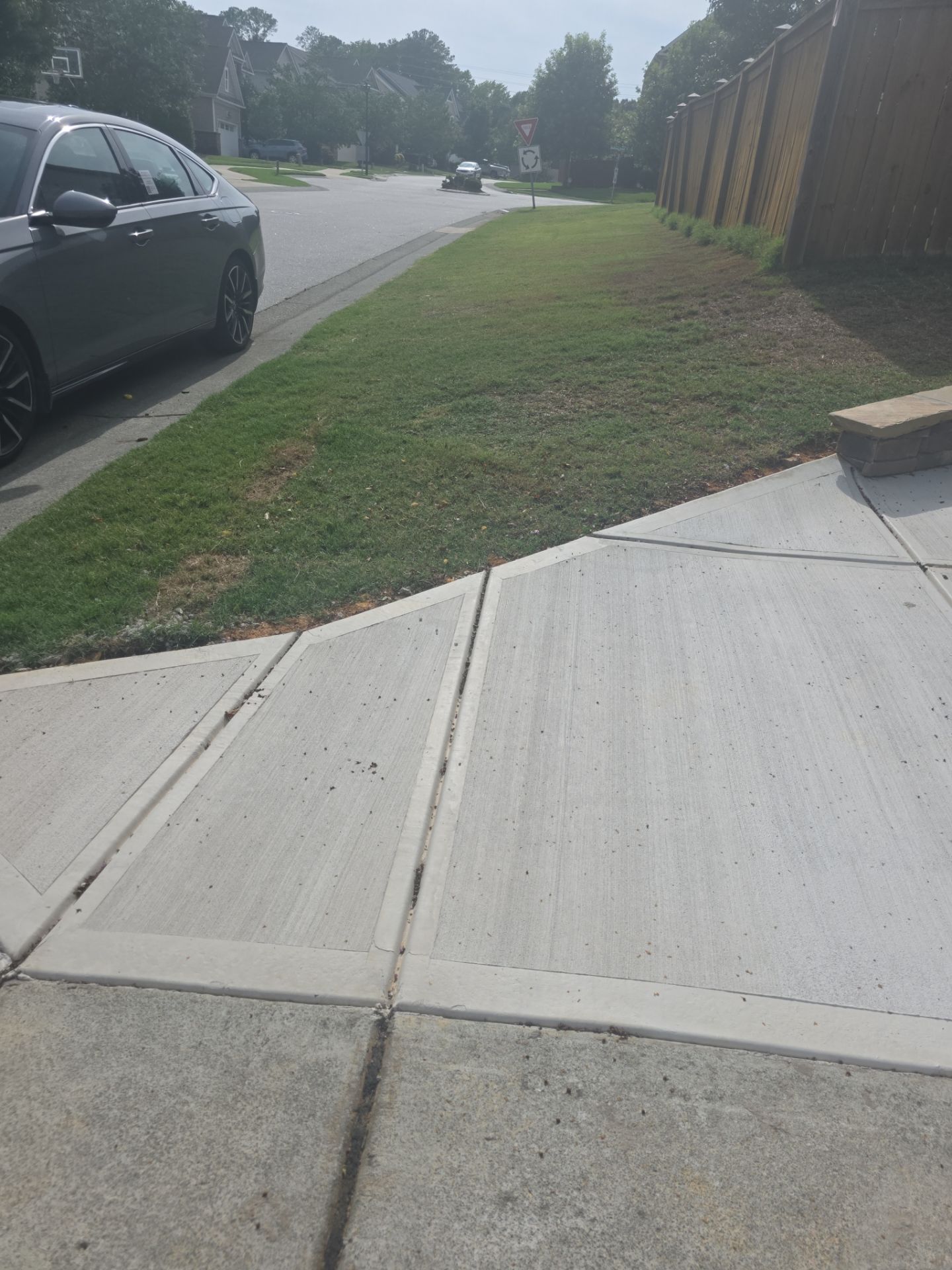 Concrete Driveway Expansion & Retaining Wall | Apex, NC by Elite Remodeling and Design LLC