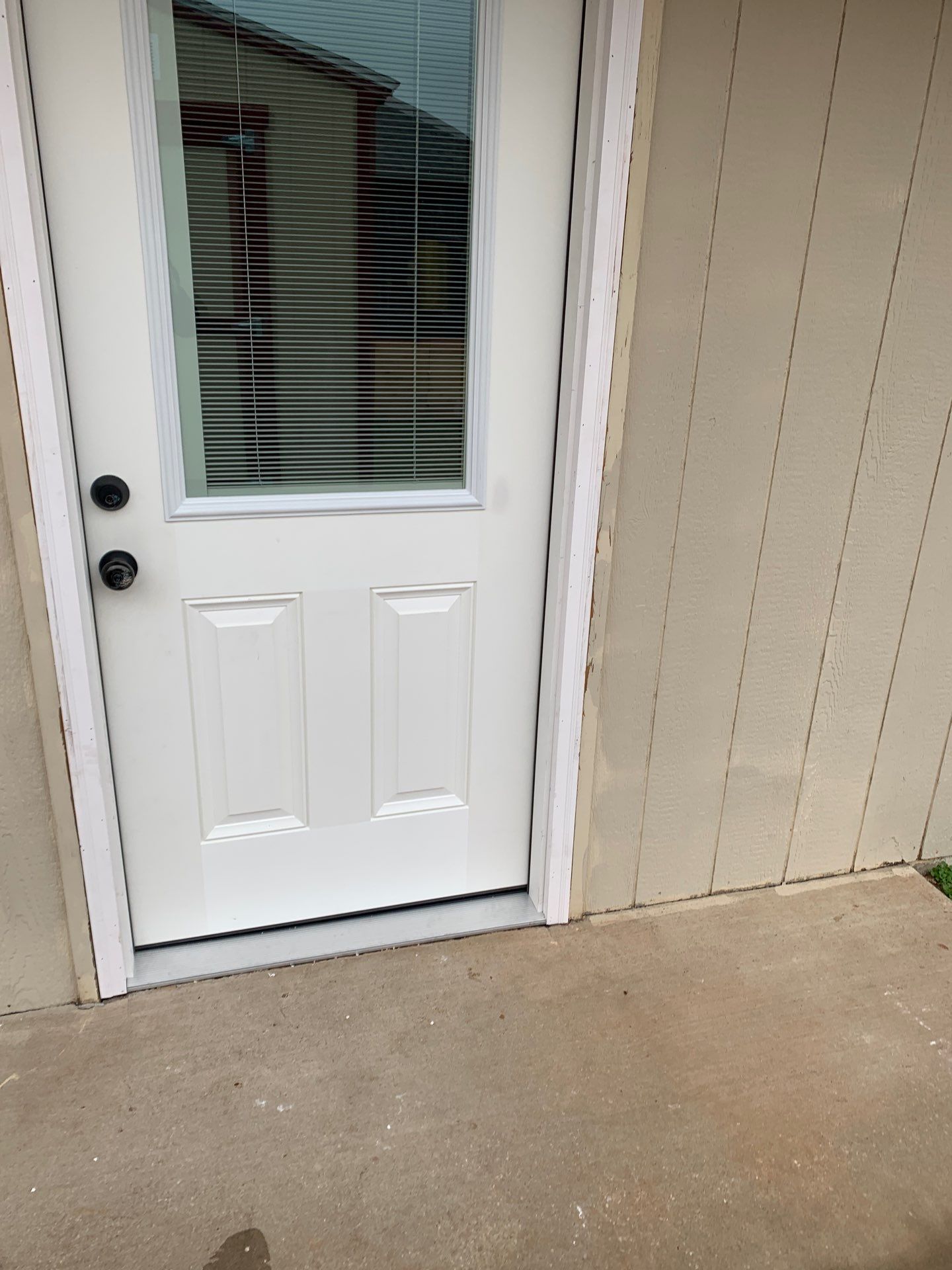 door replacement in Yukon by McCann's Roofing and Construction