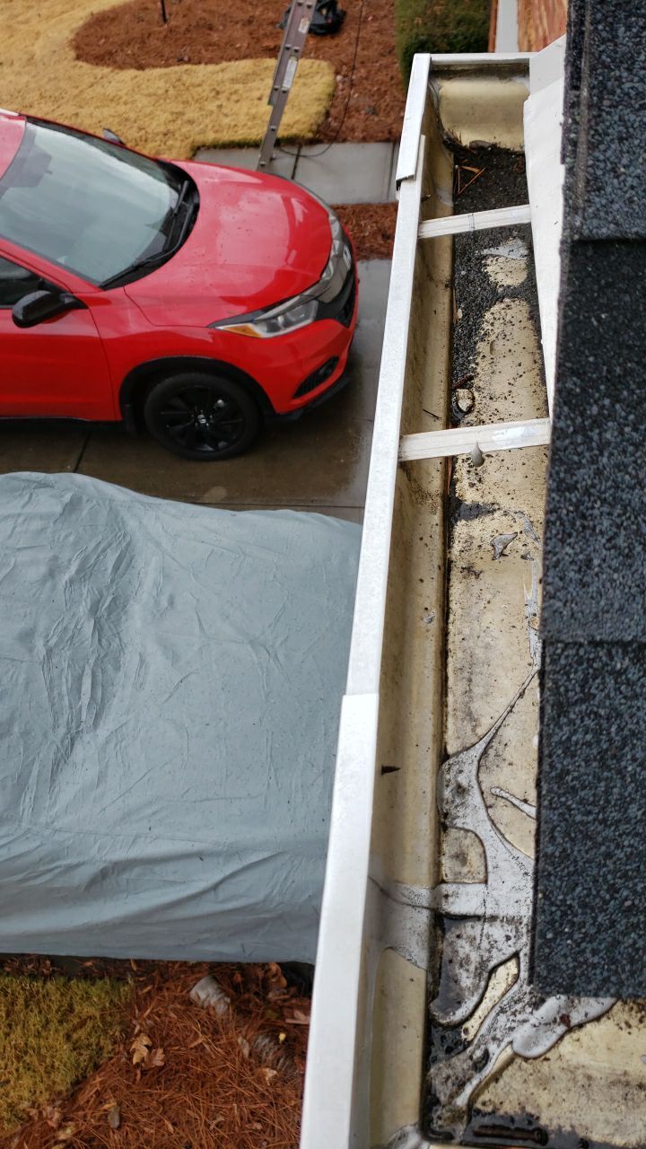 Gutter Cleaning using water by Power Wash Masters LLC