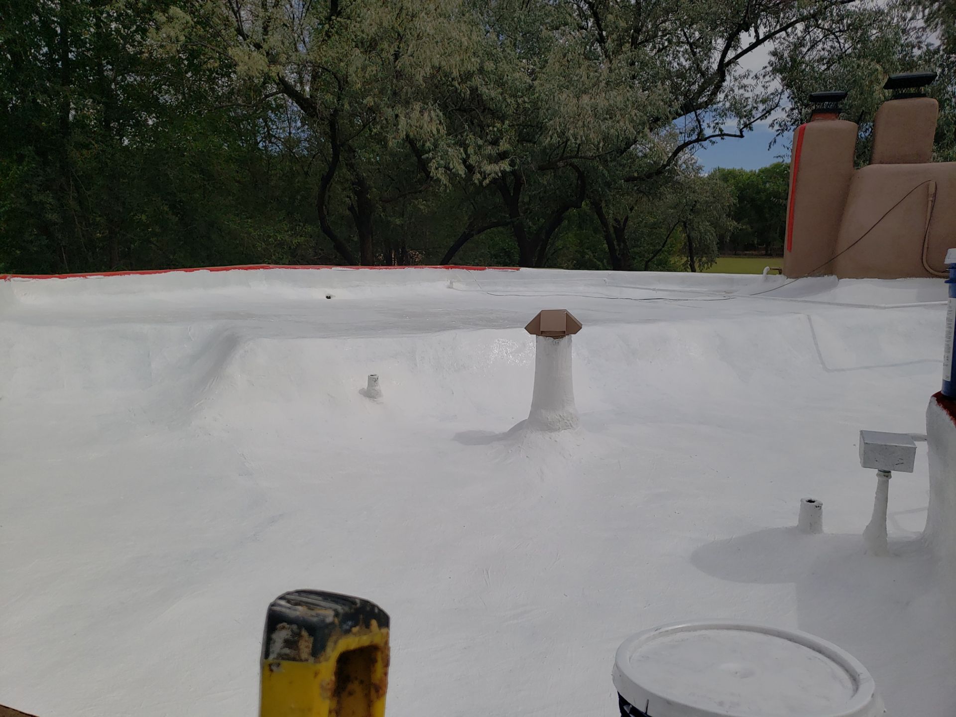 Residential roof application by SPF Services 