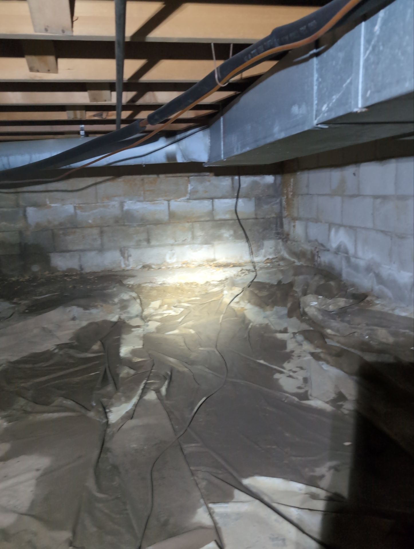 Interior Basement Waterproofing System and Egress Window Installation by Toledo Basement Repair 