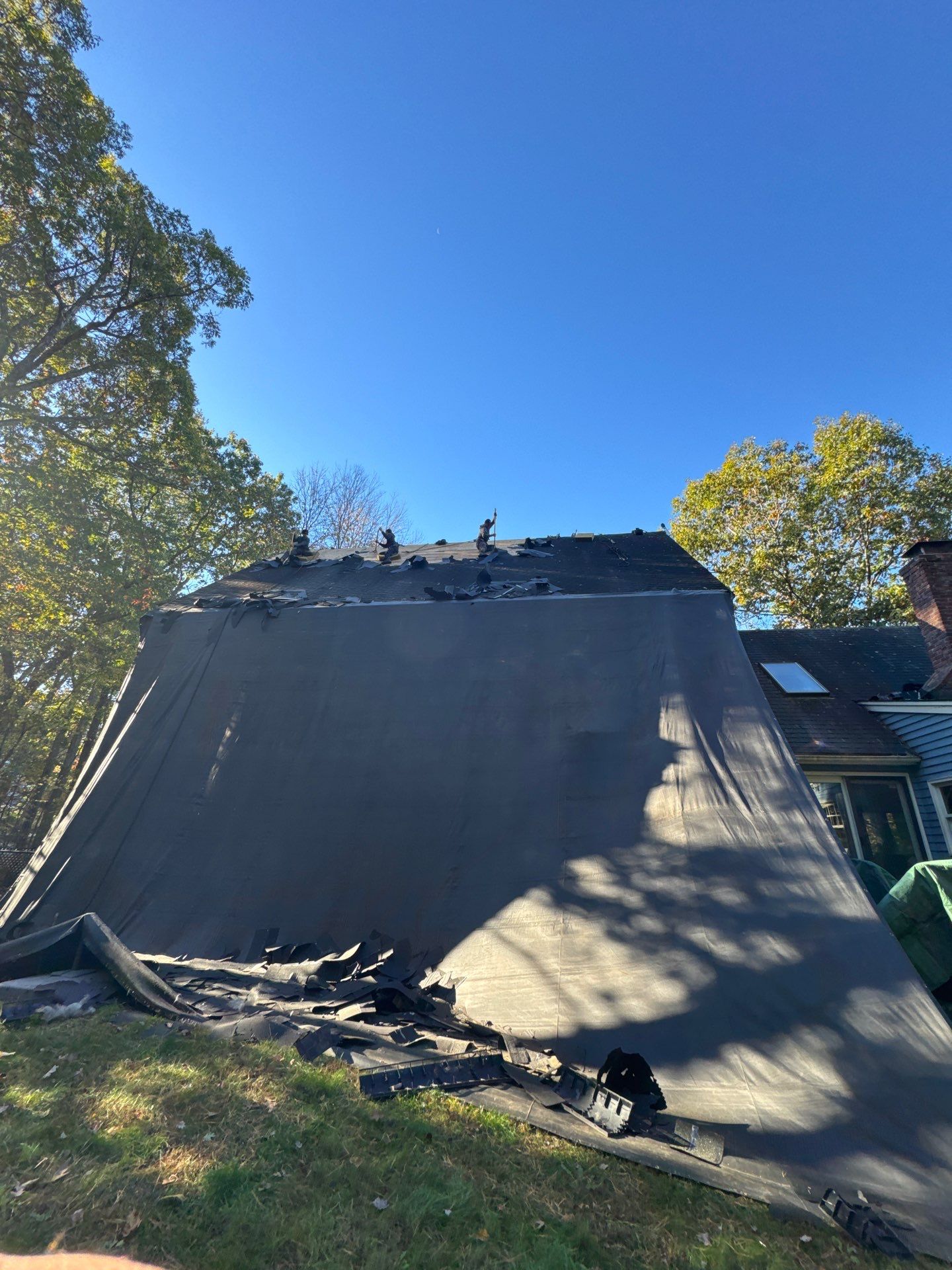 Milford Complete Roof Replacement with Velux Skylight Upgrade by Mighty Dog Roofing of Greater Middlesex County