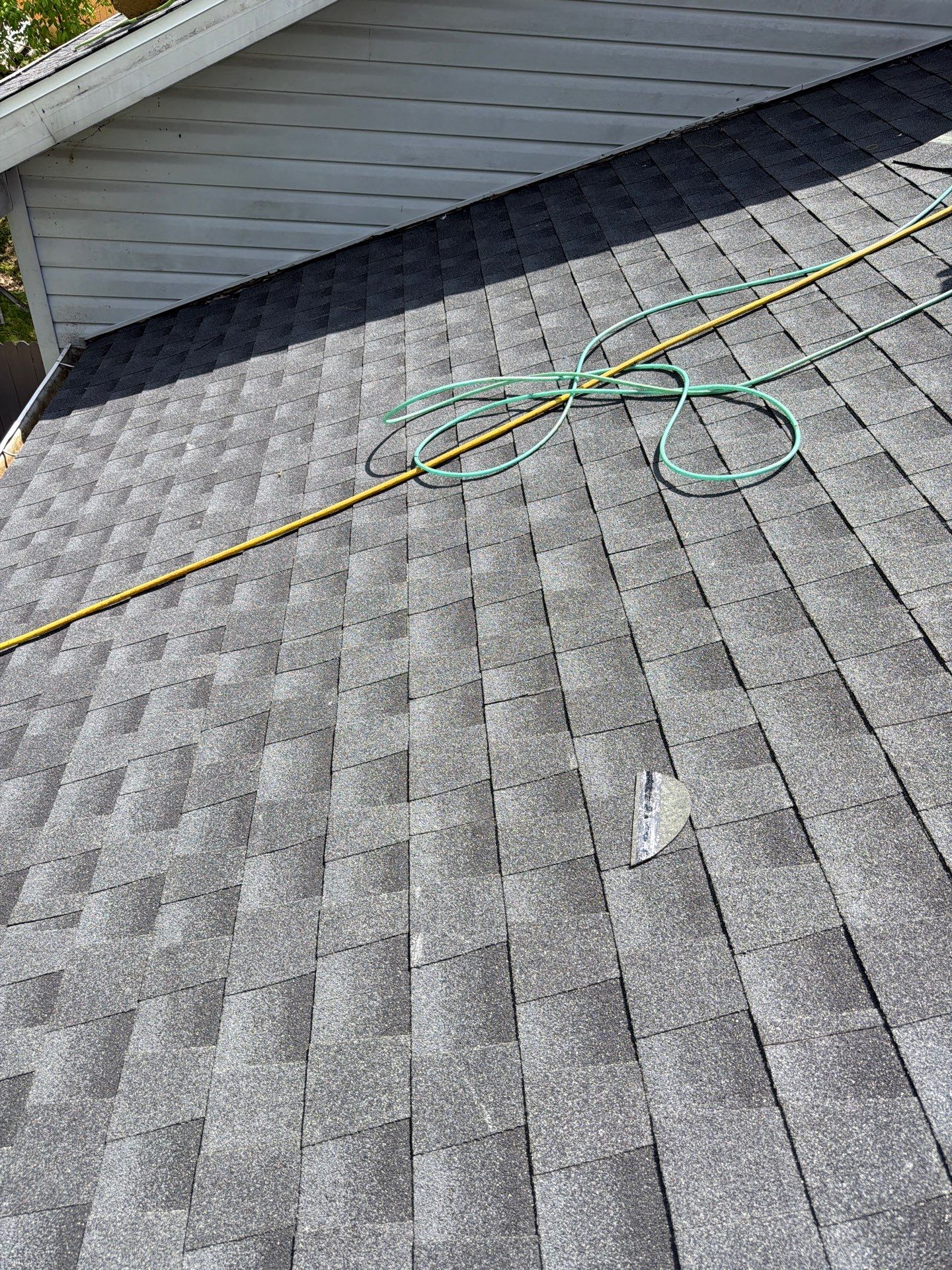 Residential Roofing Installation using GAF Timberline HDZ Charcoal by Rainstoppers Roofing