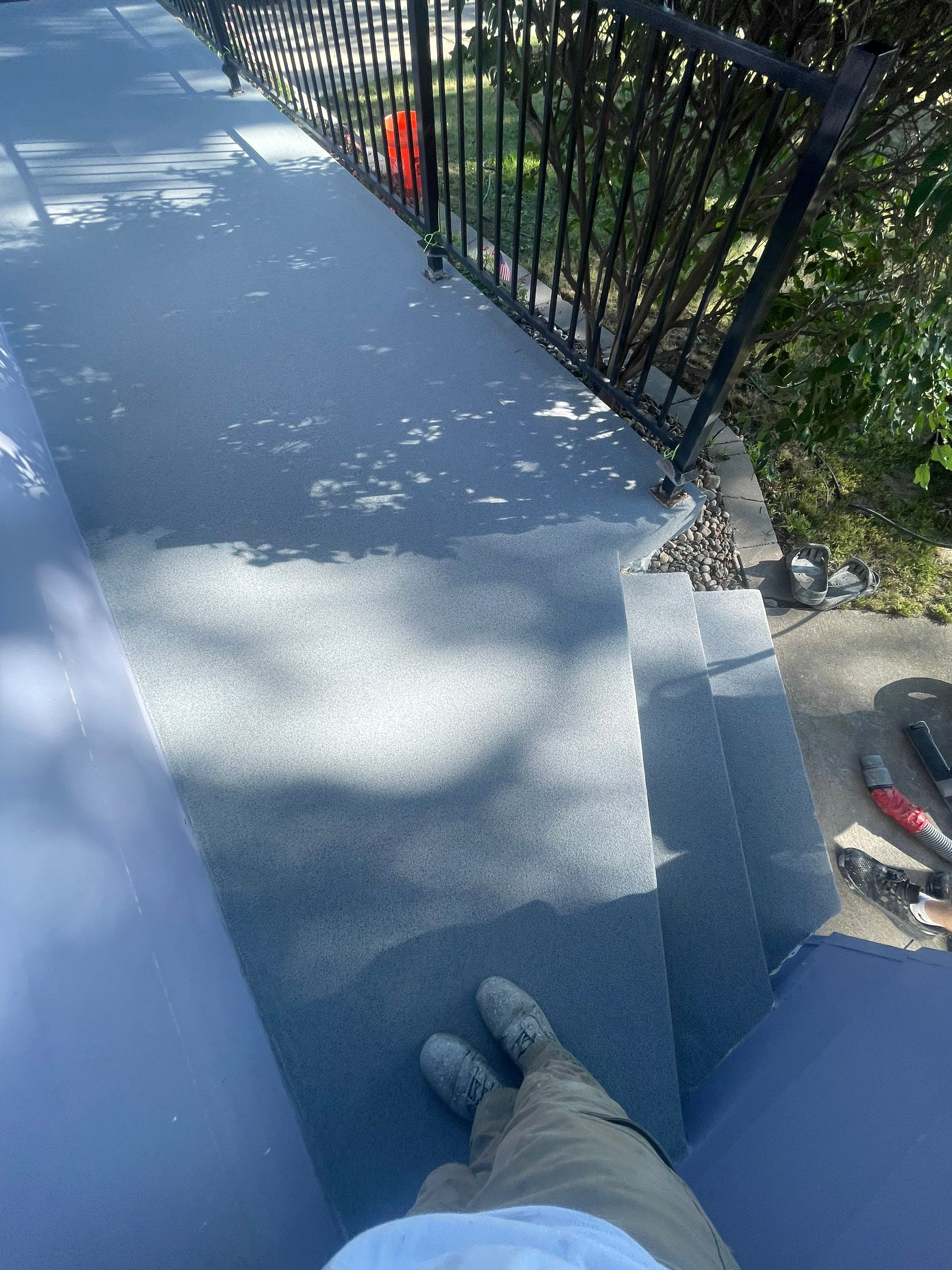 Sioux Falls Concrete Porch Coating with Starry Evening Finish by Select Painting, Coatings & Garage Cabinets
