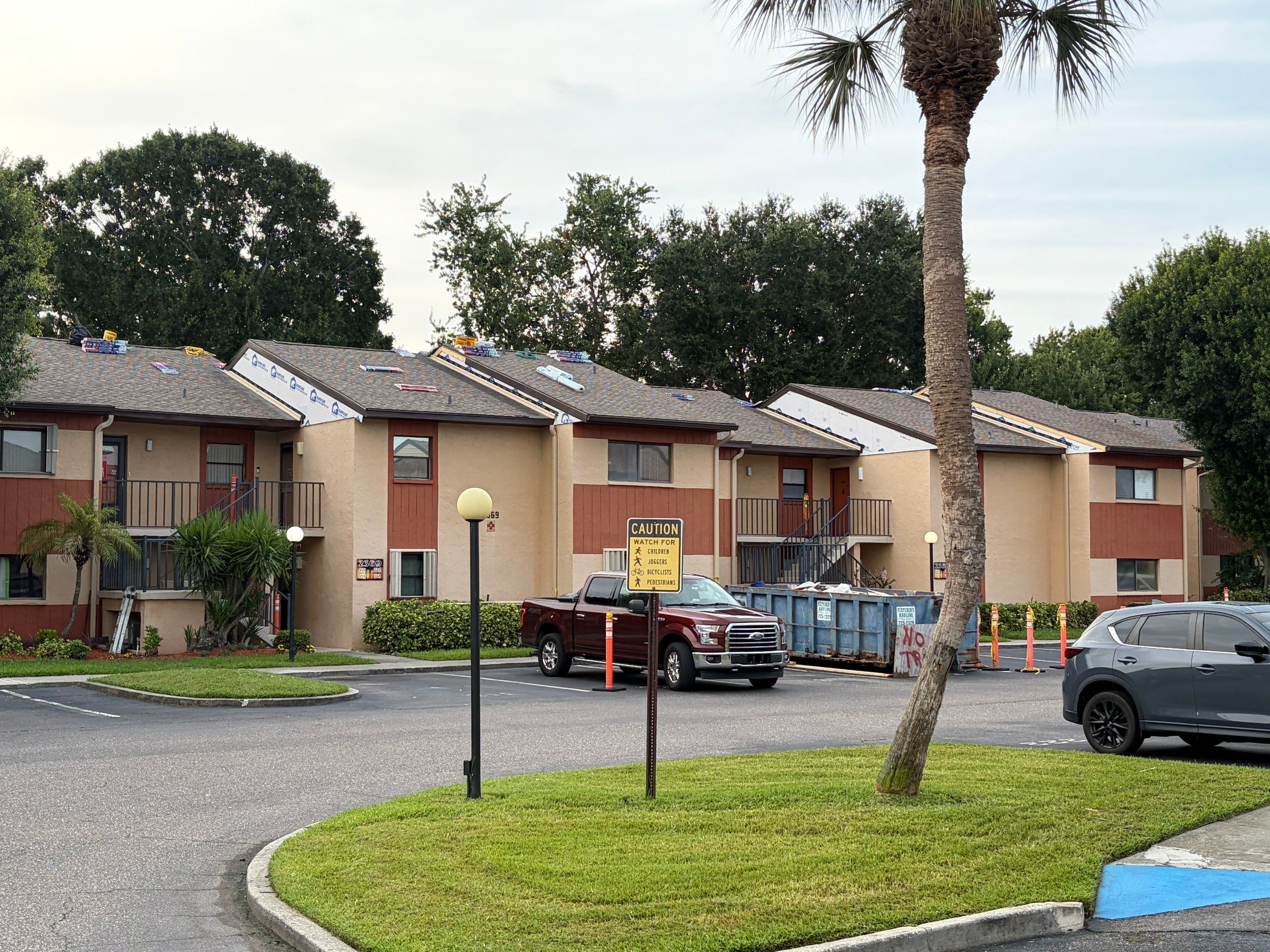 Multi-Family Roof Replacement and Siding Installation in Melbourne by Florida Roofing and Renovations Inc.