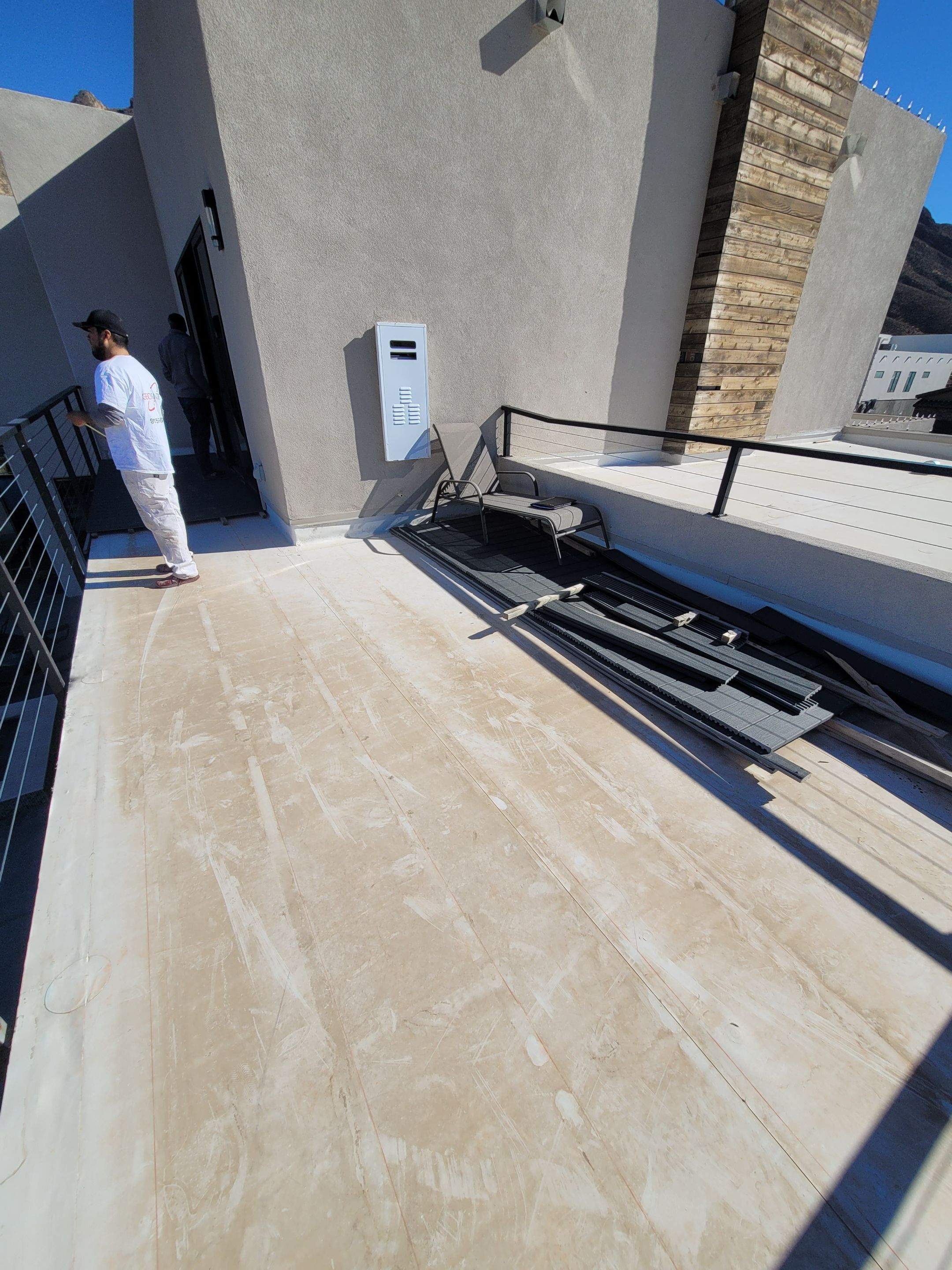 Exterior Wood Staining and Composite Decking Installation by Regal Renovate