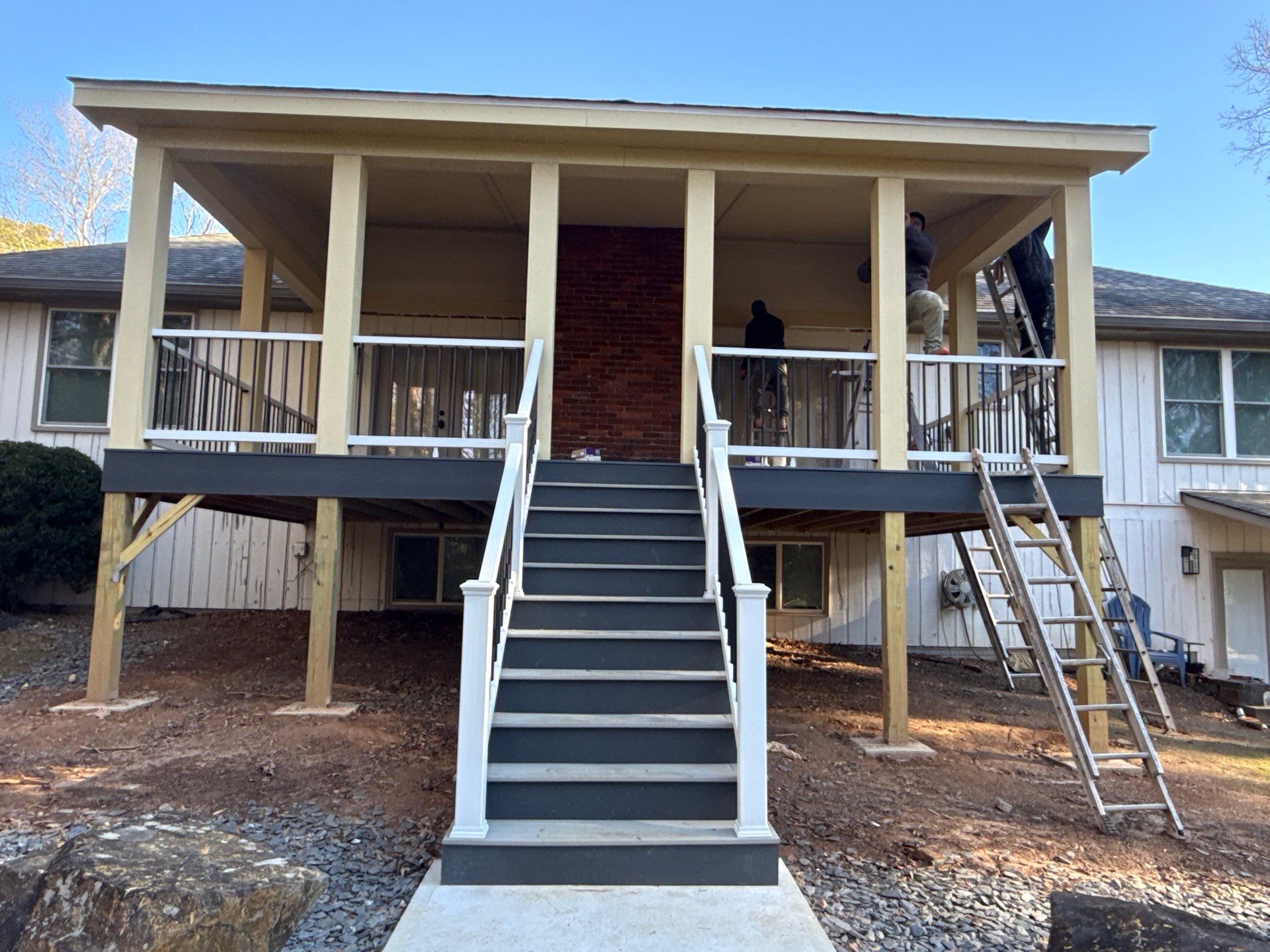 Deck and Shed Roof Style Covered Build using Trex Decking Products by Nelson Exteriors 