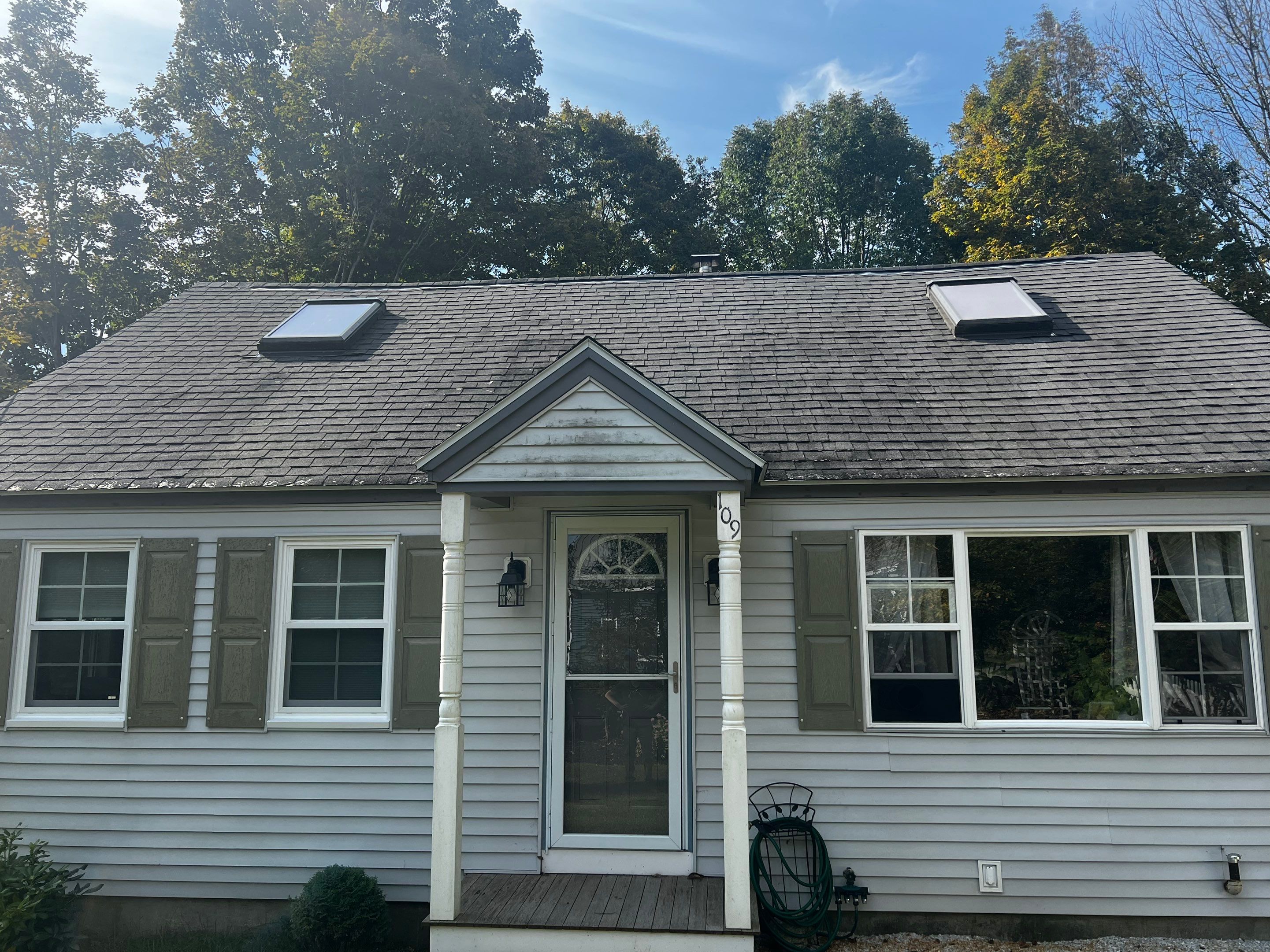 Complete Exterior Renovation Featuring Owens Corning Shingles and Vinyl Siding by Tall pine roofing