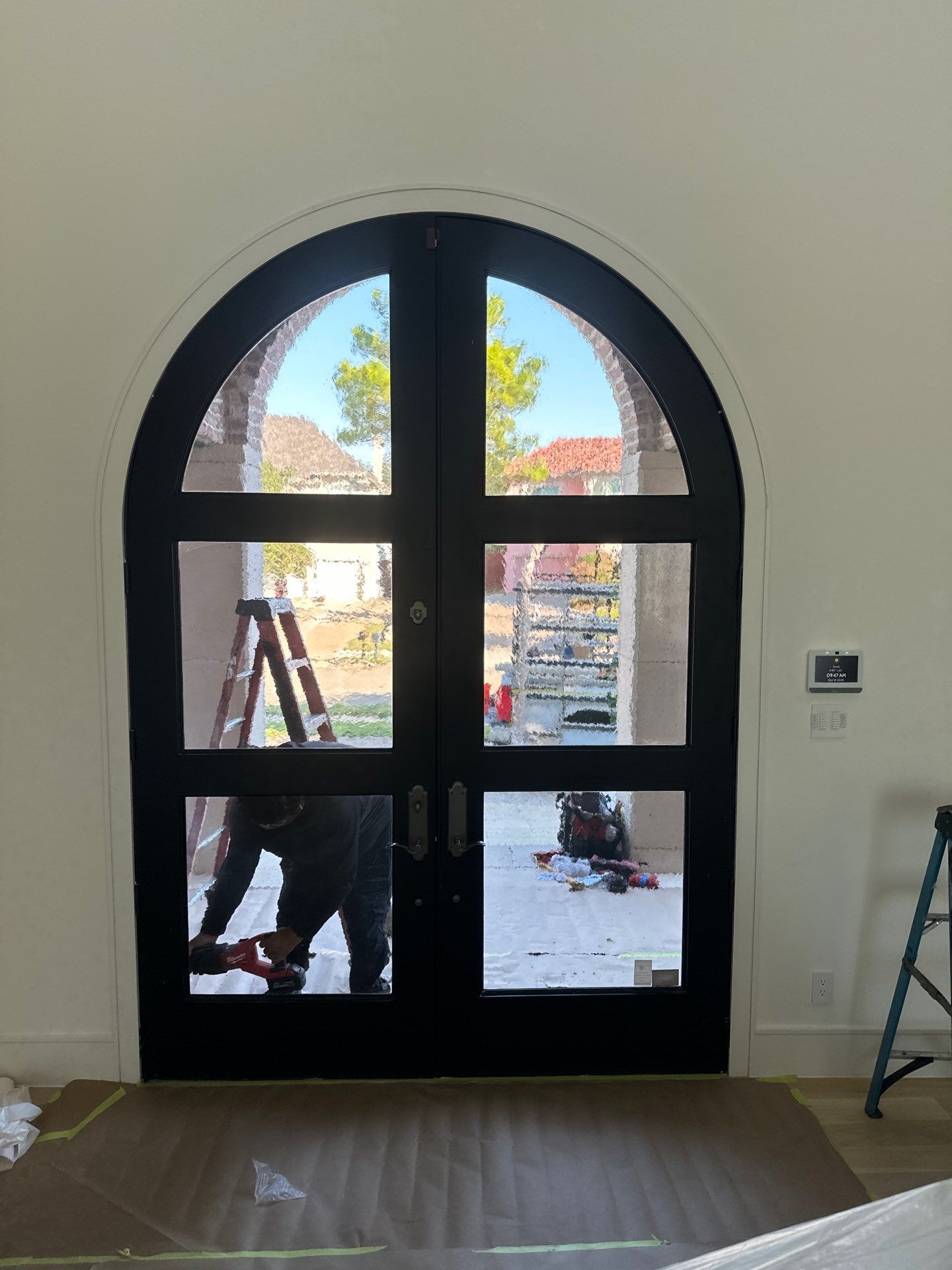 Custom Arched Metal Entry Door Installation in Plano by Solara Custom Living
