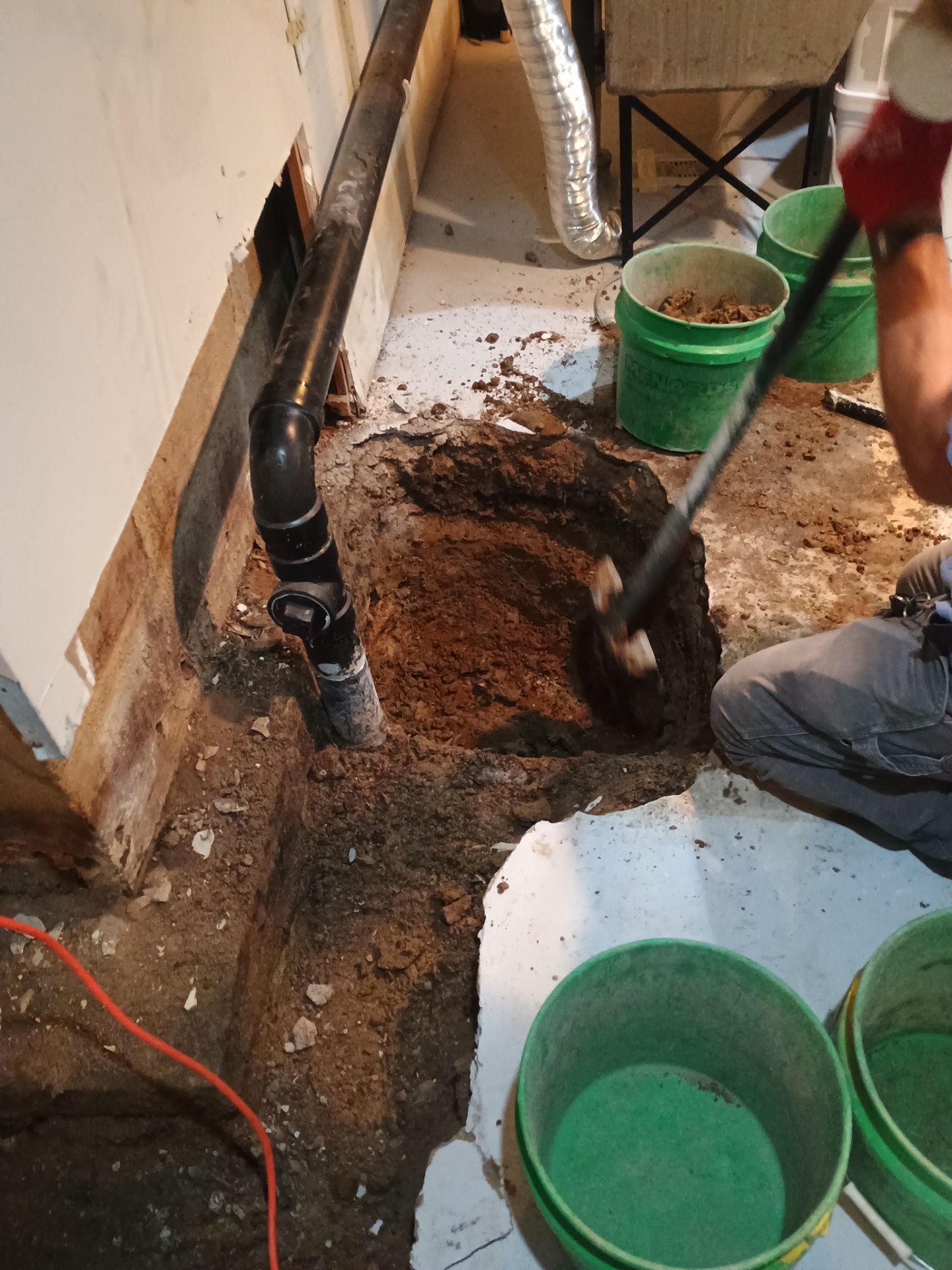 Interior Drain Tile & Sump Pump Installation in St. Paul, MN by Waterproofing Northeast
