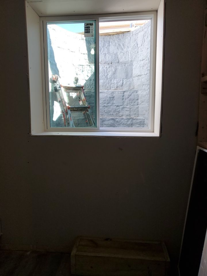 Egress Window Installation using Rockwell Egress Fiberglass Egress Window Well by Toledo Basement Repair 