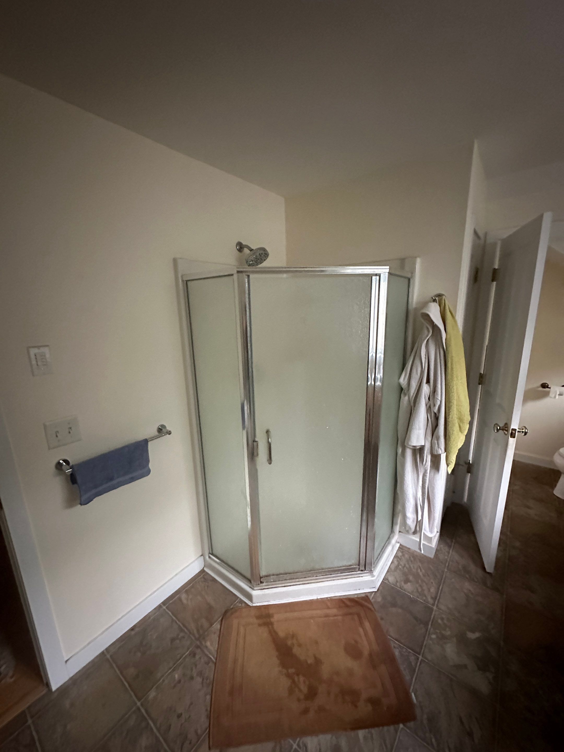 Solid Surface Neo Angle Shower by Renovatic LLC