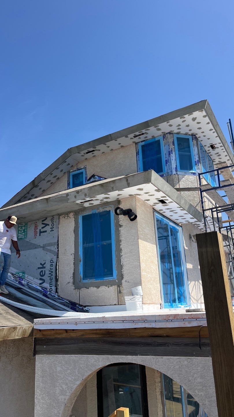 Installing Windows on a Submarine  by Bayfront Roofing and Construction