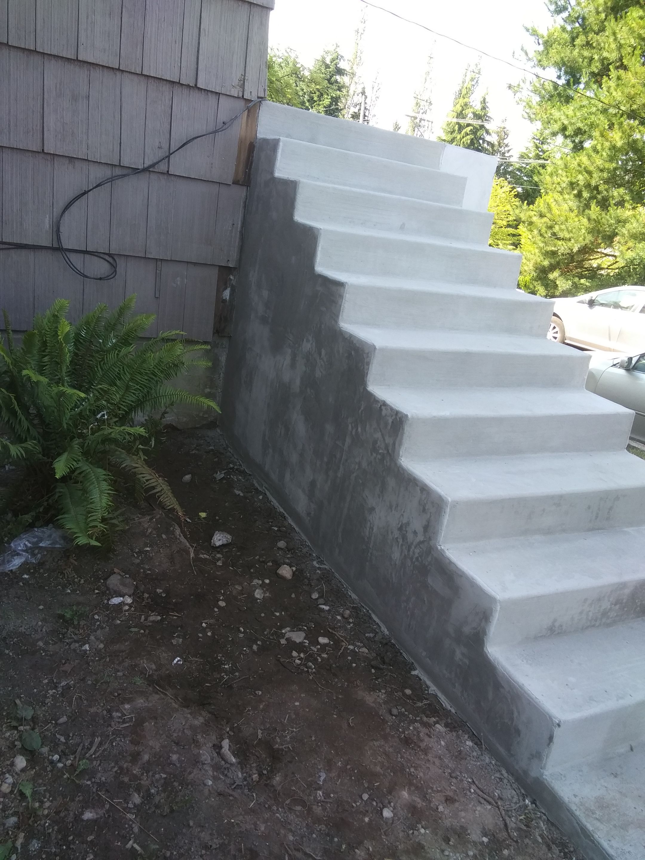 Cheyanne | Concrete Wall & Stairs  by Jireh Asphalt & Concrete Inc 