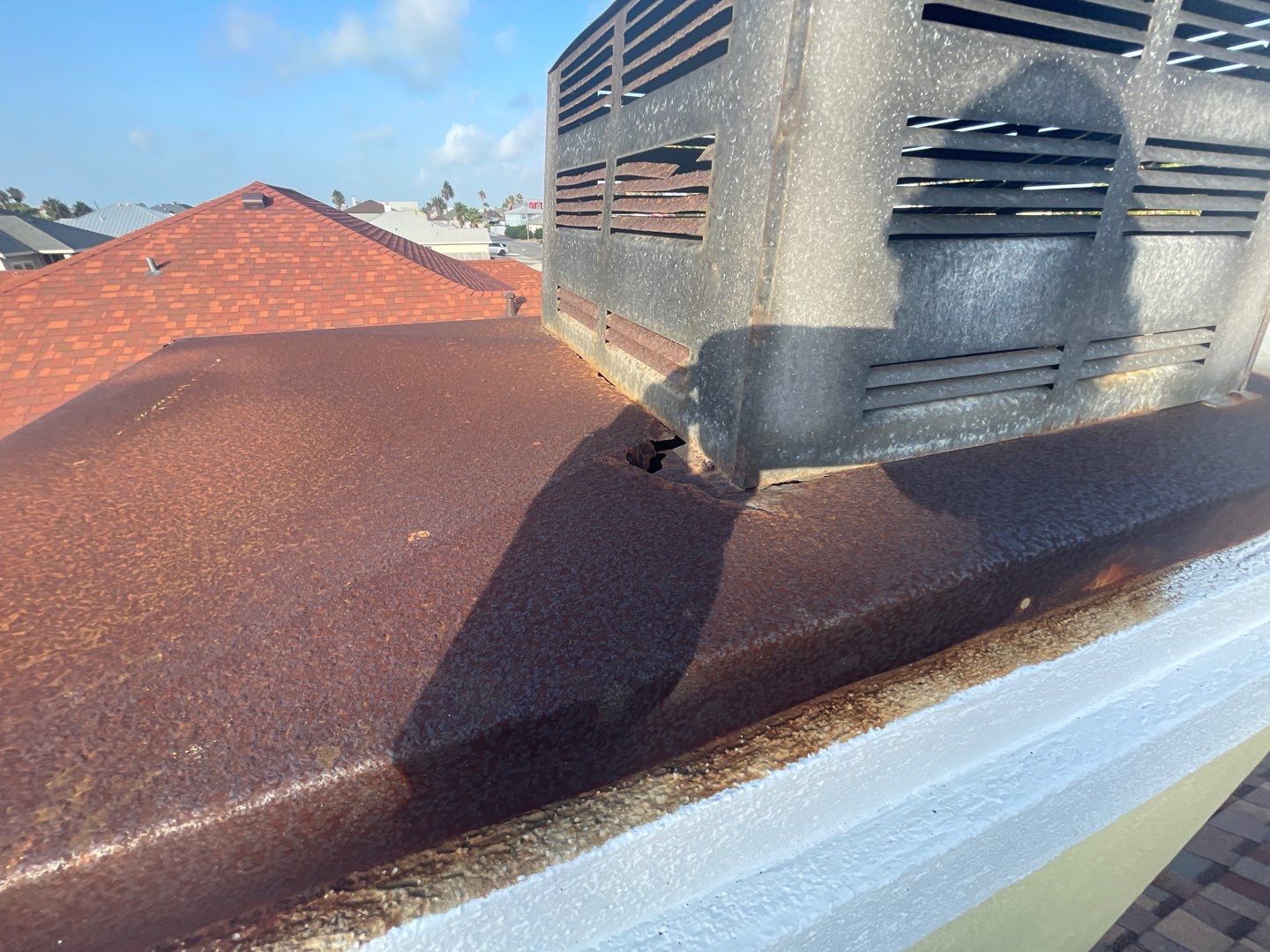 Residential Roofing Repair - Replacing Chimney Cap by Lighthouse Roofing