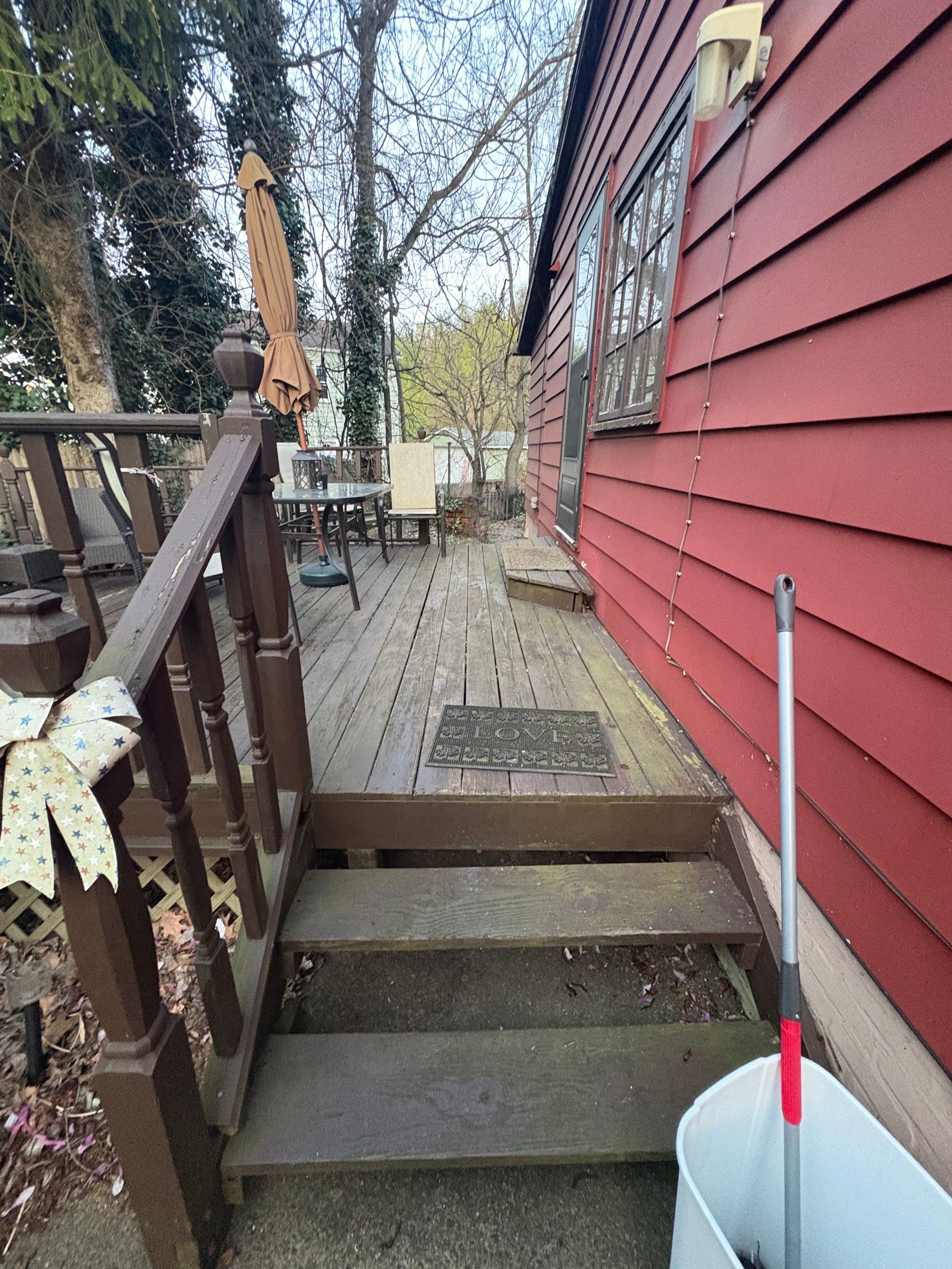 Roof sunspace deck  by Cousins Roofing Siding & Decks