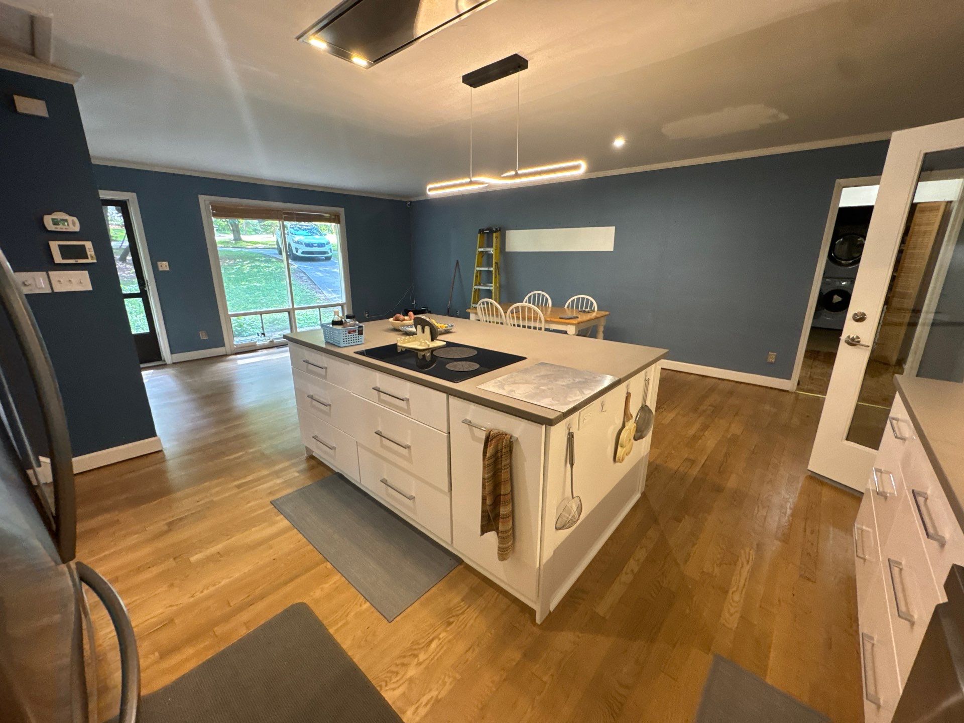 Modern Kitchen Remodeling with Large Central Island in Doraville by Swift Home Renovations