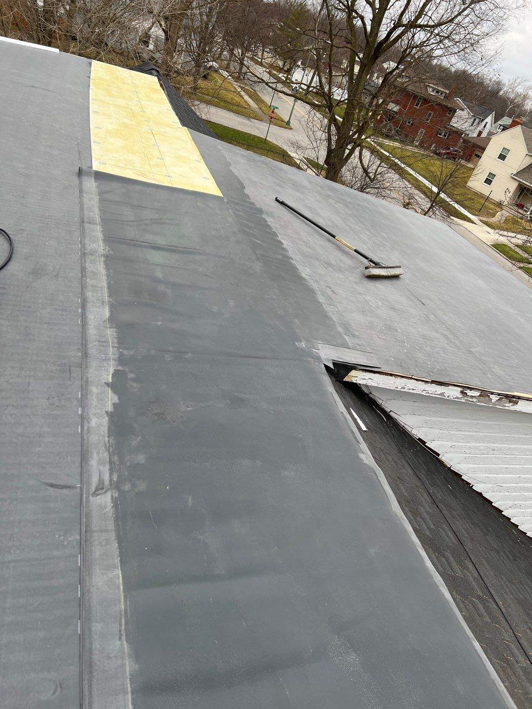 Residential Roofing Installation using 60 mil rubber roof by Nitro Roofing and Construction
