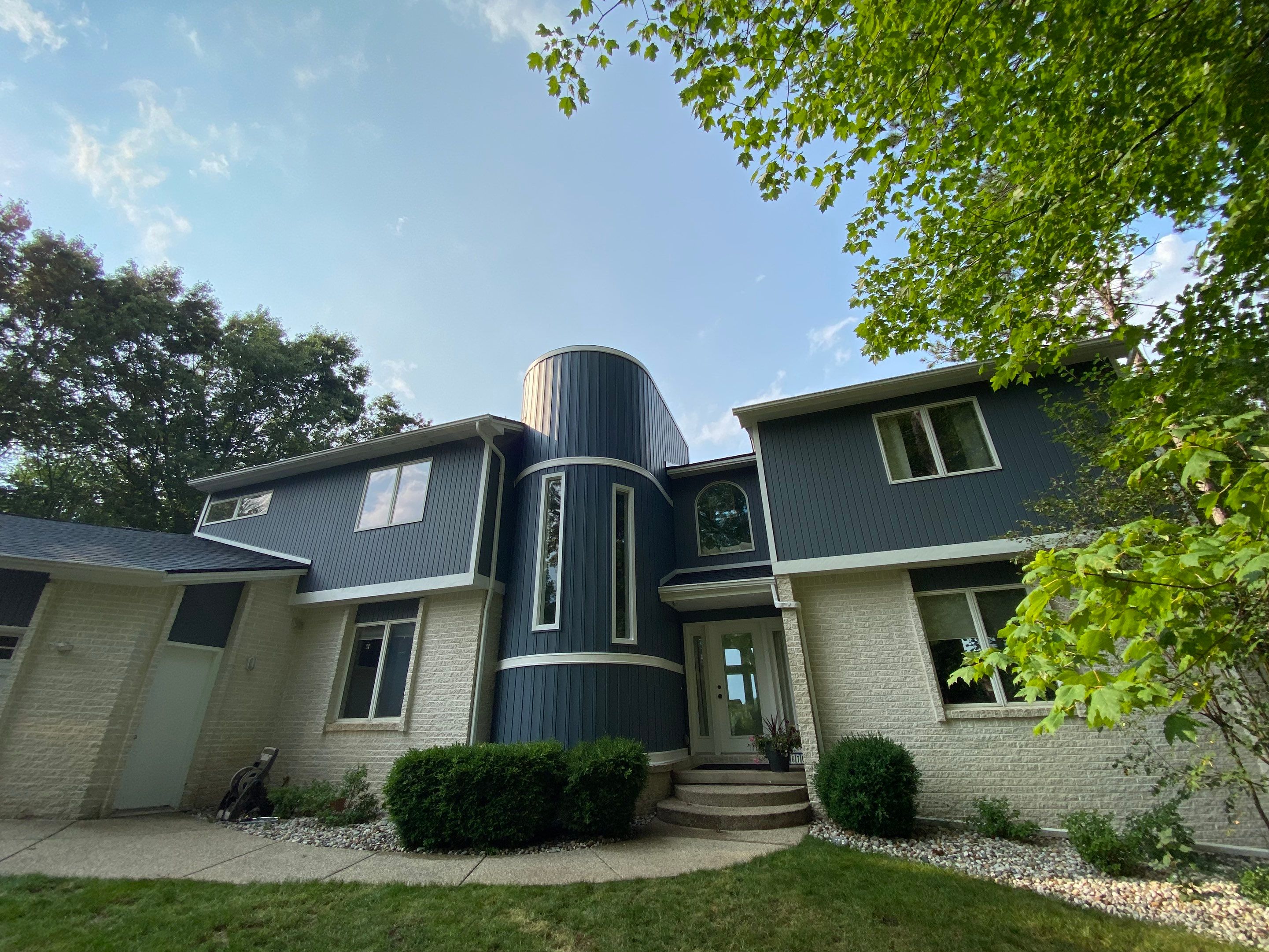 Siding Replacement using CertainTeed Board & Batten Pacific Blue by 180 Contractors