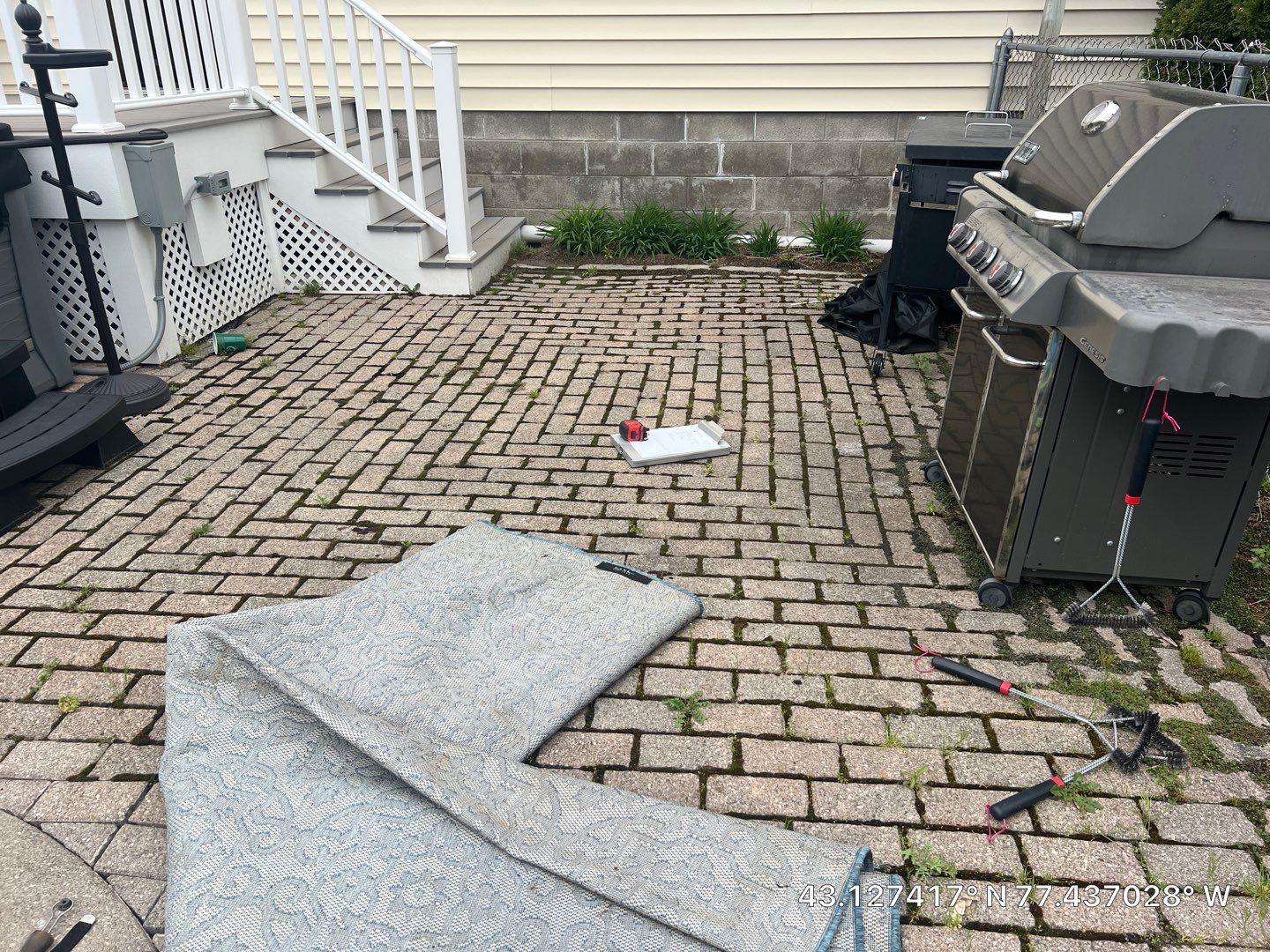 Bluestone stamped concrete patio  by NG Masonry & Construction LLC