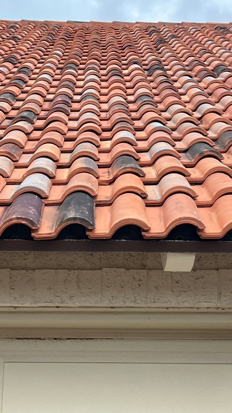 Off with the Tile and on with the TILCOR stone coated metal.  by Bayfront Roofing and Construction