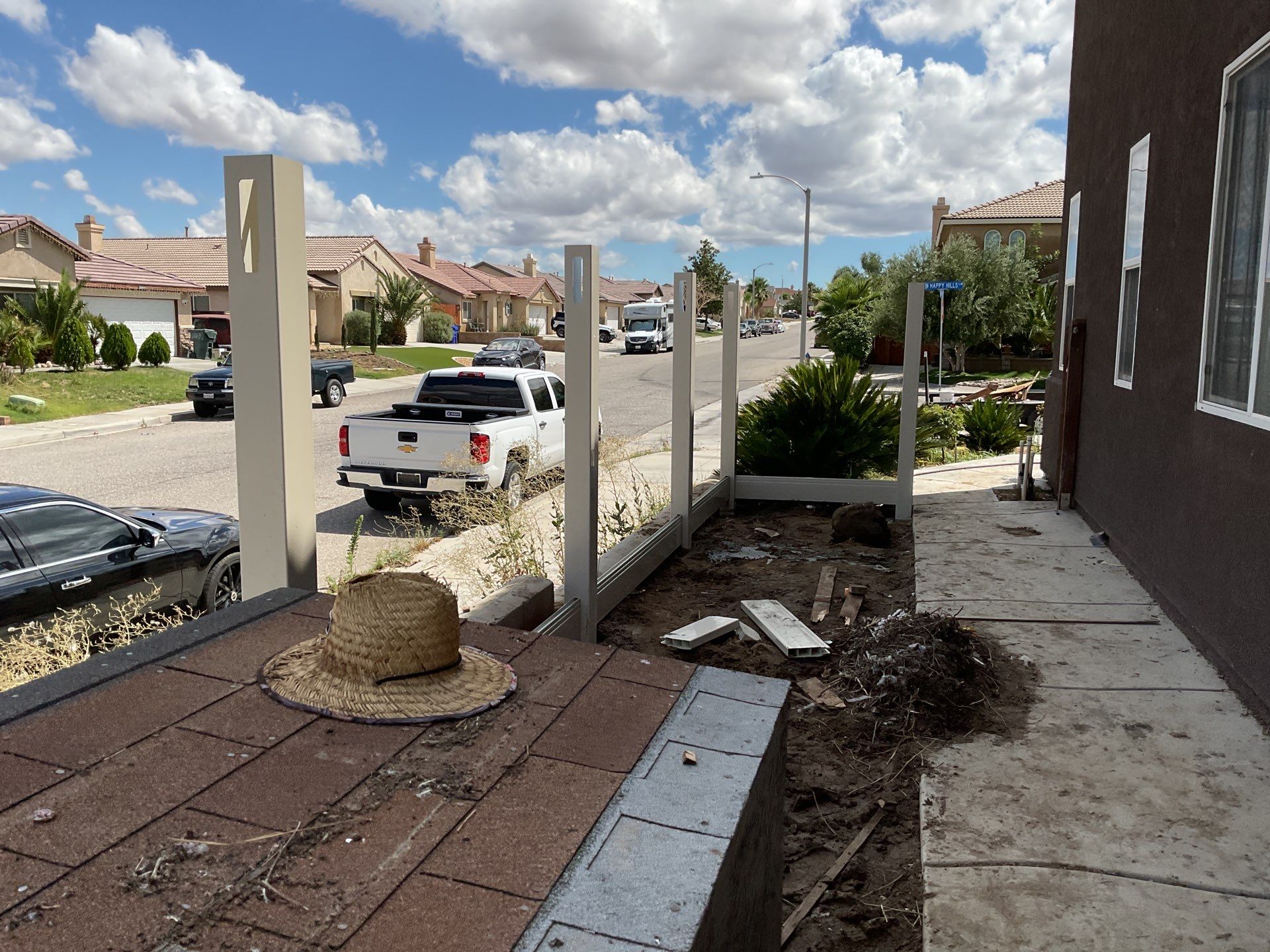Tan Vinyl by Fence Guys Inc. 