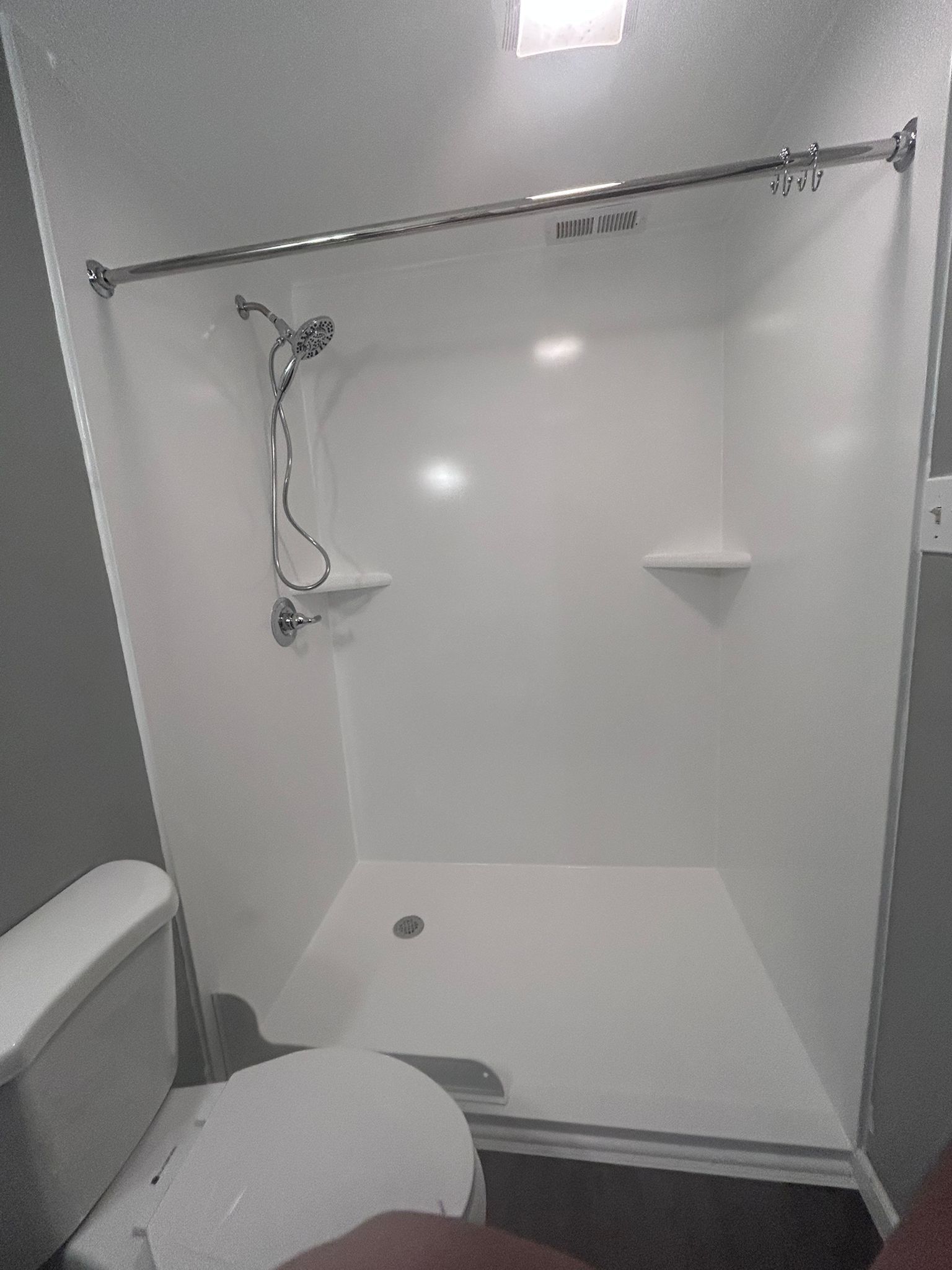 2 bathroom remodels using maintenance free products by Window Depot of Annapolis
