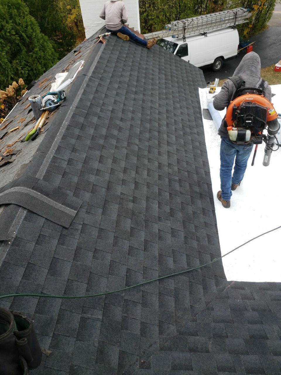 Asphalt Roof Replacement by Custom Installations