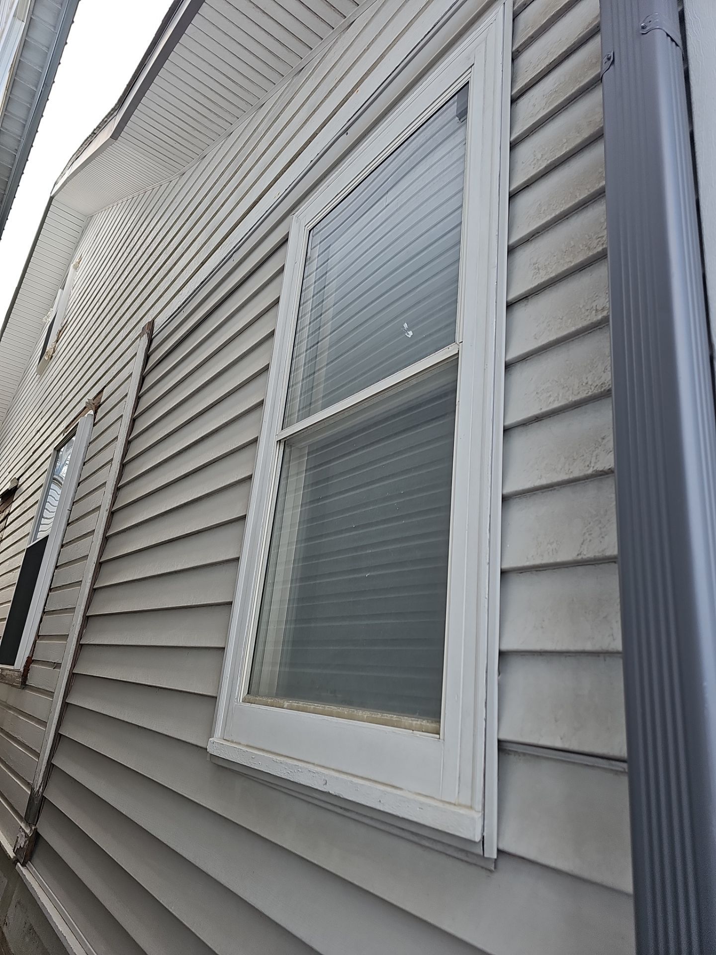 Window replacement using ProVia Aspect windows. Siding installation by Window Depot of Annapolis