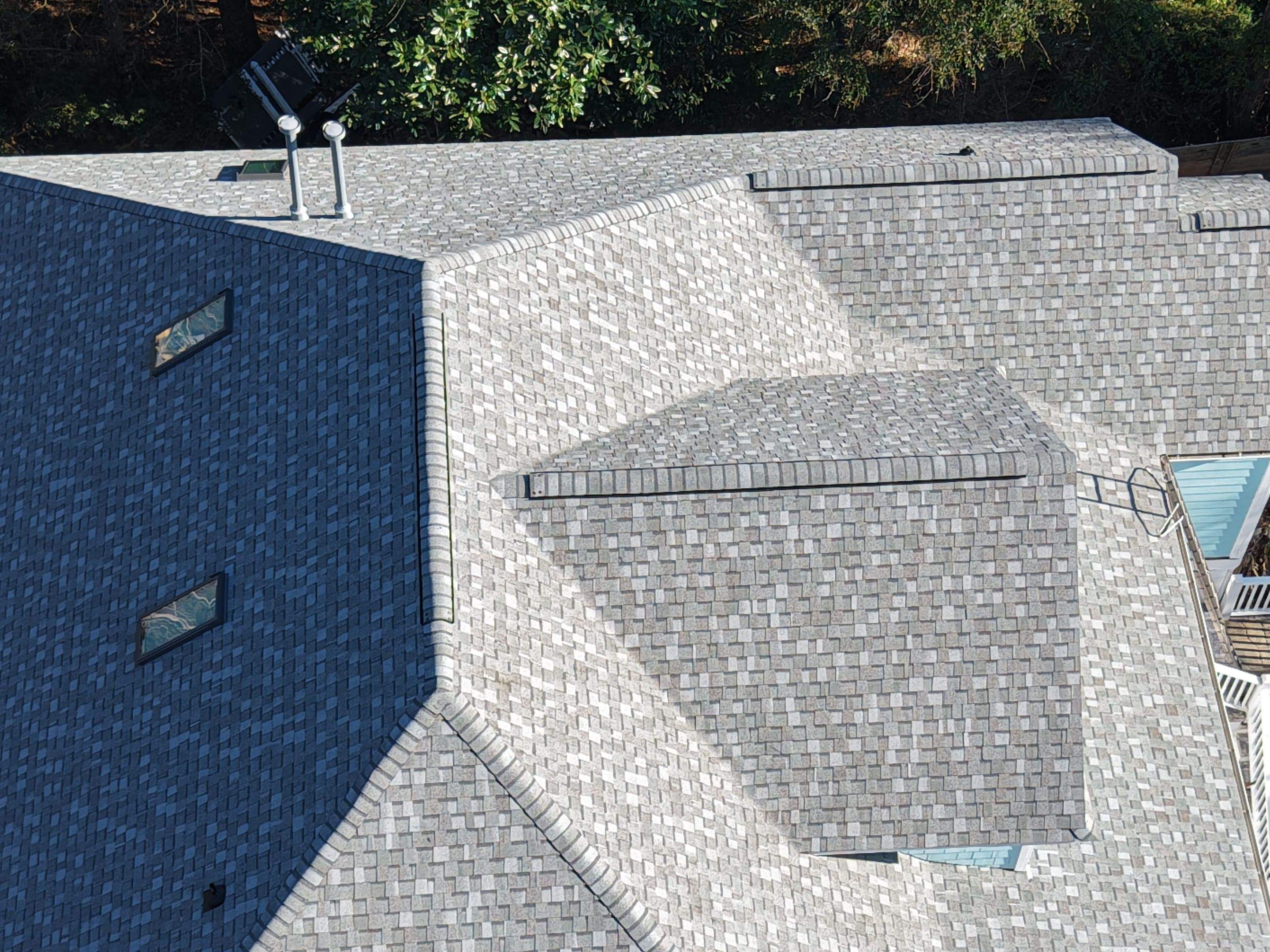 Indigo Plantation Southport NC Fortified Roof Replacement Southport NC CertainTeed Landmark Pro Cobblestone Gray Skylight Installation by RGR Construction and Roofing, LLC