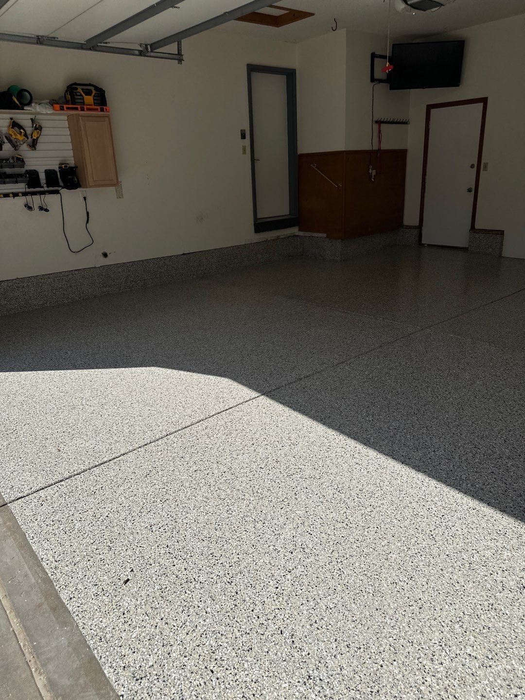 Two-Stall Epoxy Garage Floor Coating and Repair in Lincoln by Goat Coatings