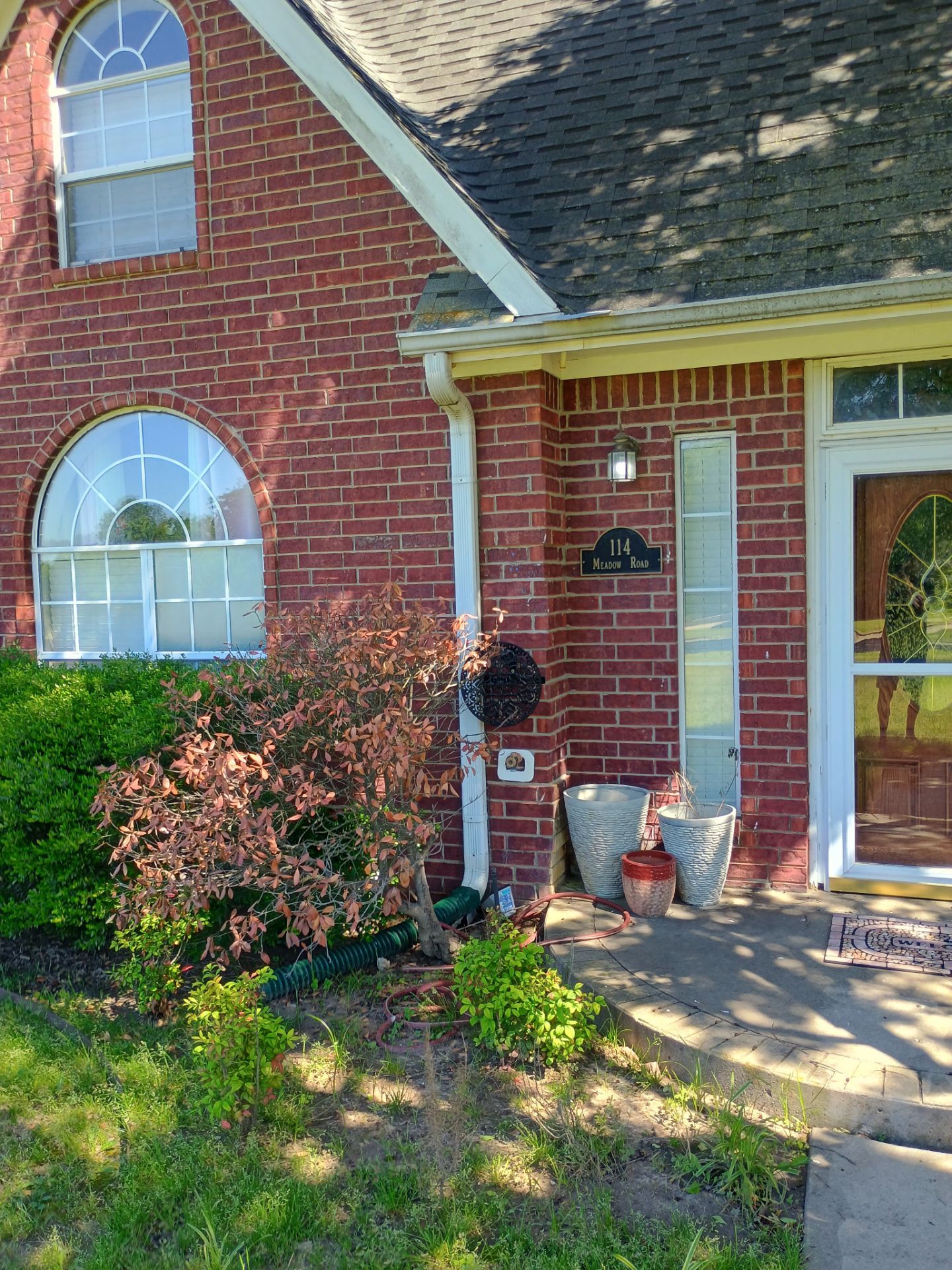 Architectural Shingle Roof Replacement for Brick Residence in Ardmore by BANA Roofing and Solar Supply