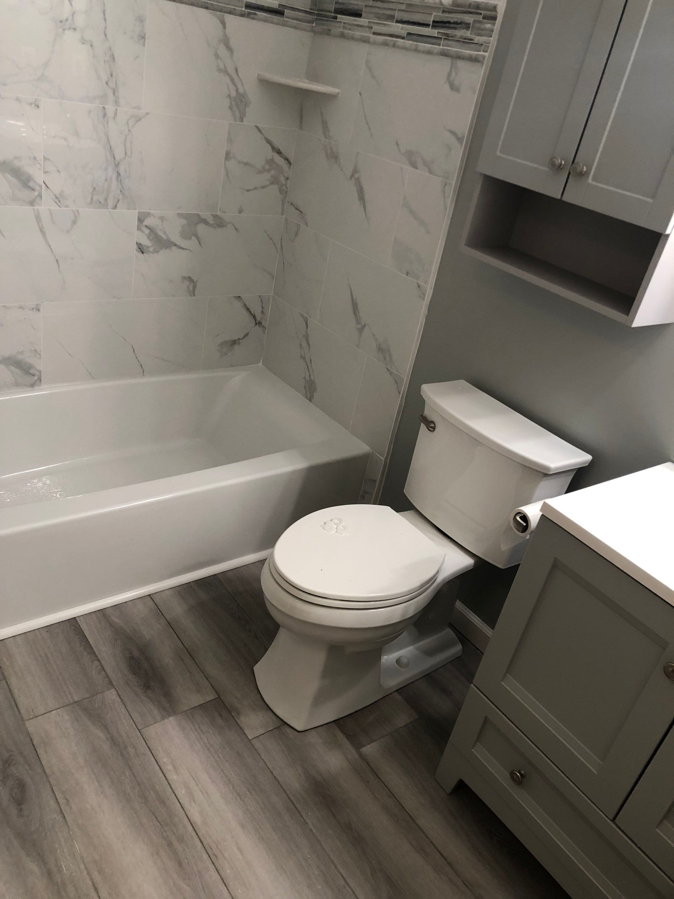 Bathroom Remodel using Tile by Home Concepts Construction