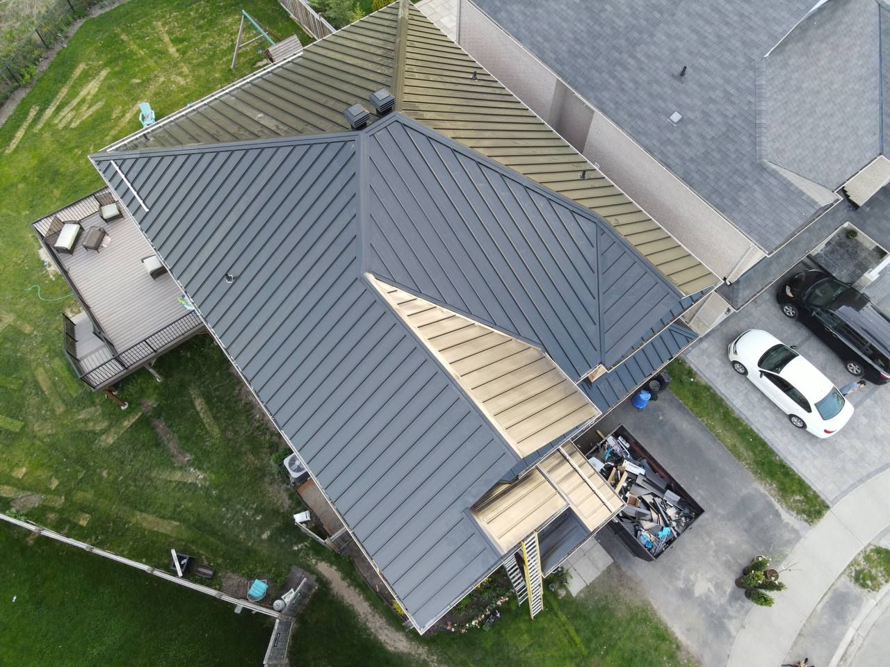 Residential Roofing Installation using 16" Standing Seam Panels by Jay Carter Roofing & Sheet Metal