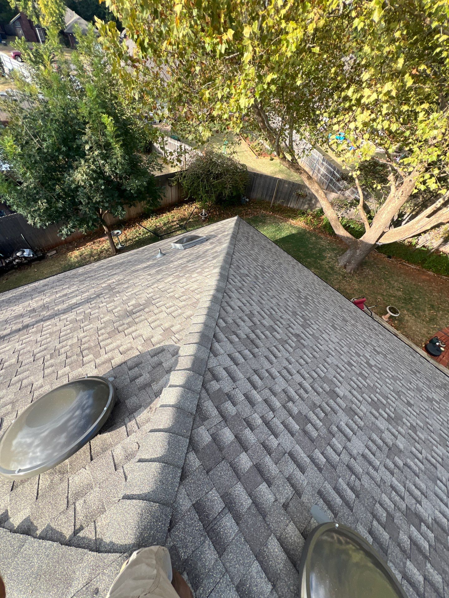 Roof Replacement and Sun Tunnel Installation in Edmond, OK by McCann's Roofing and Construction