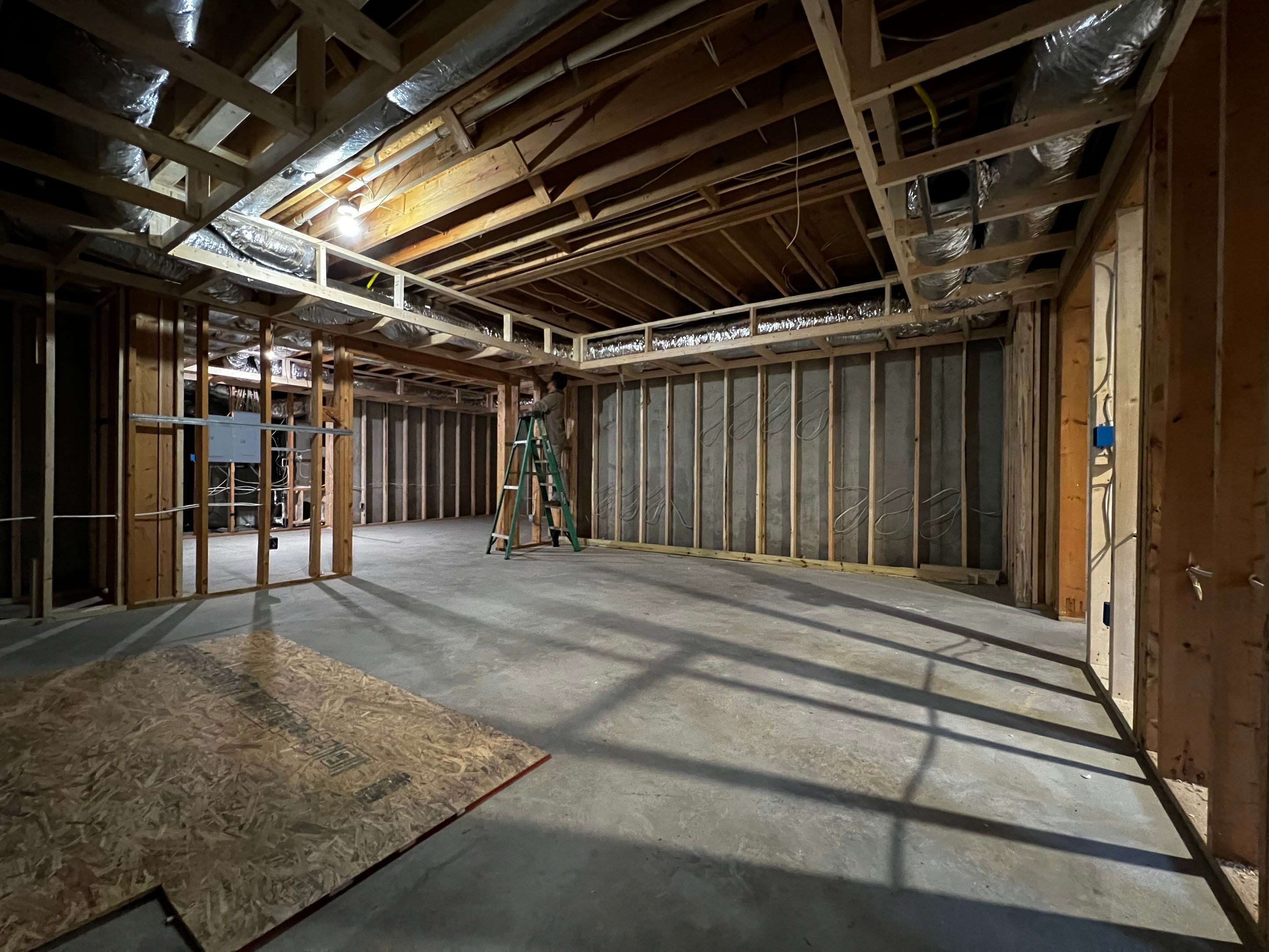 Finished Basement with Custom Built-ins and Full Bathroom in Acworth by Swift Home Renovations