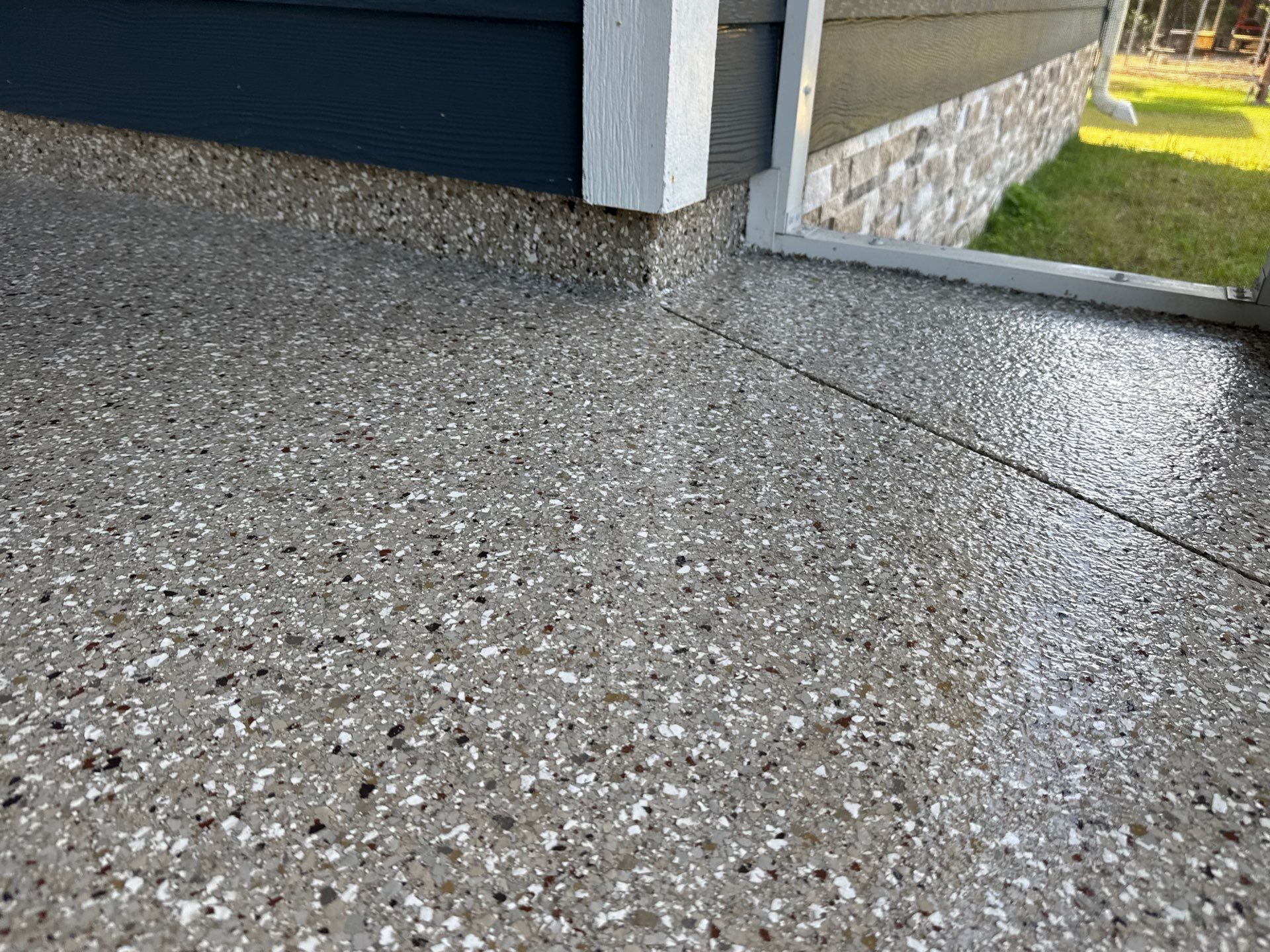Front and Back Porches in Chiefland, FL in Pebble Beach by Cross Creek Concrete Coatings