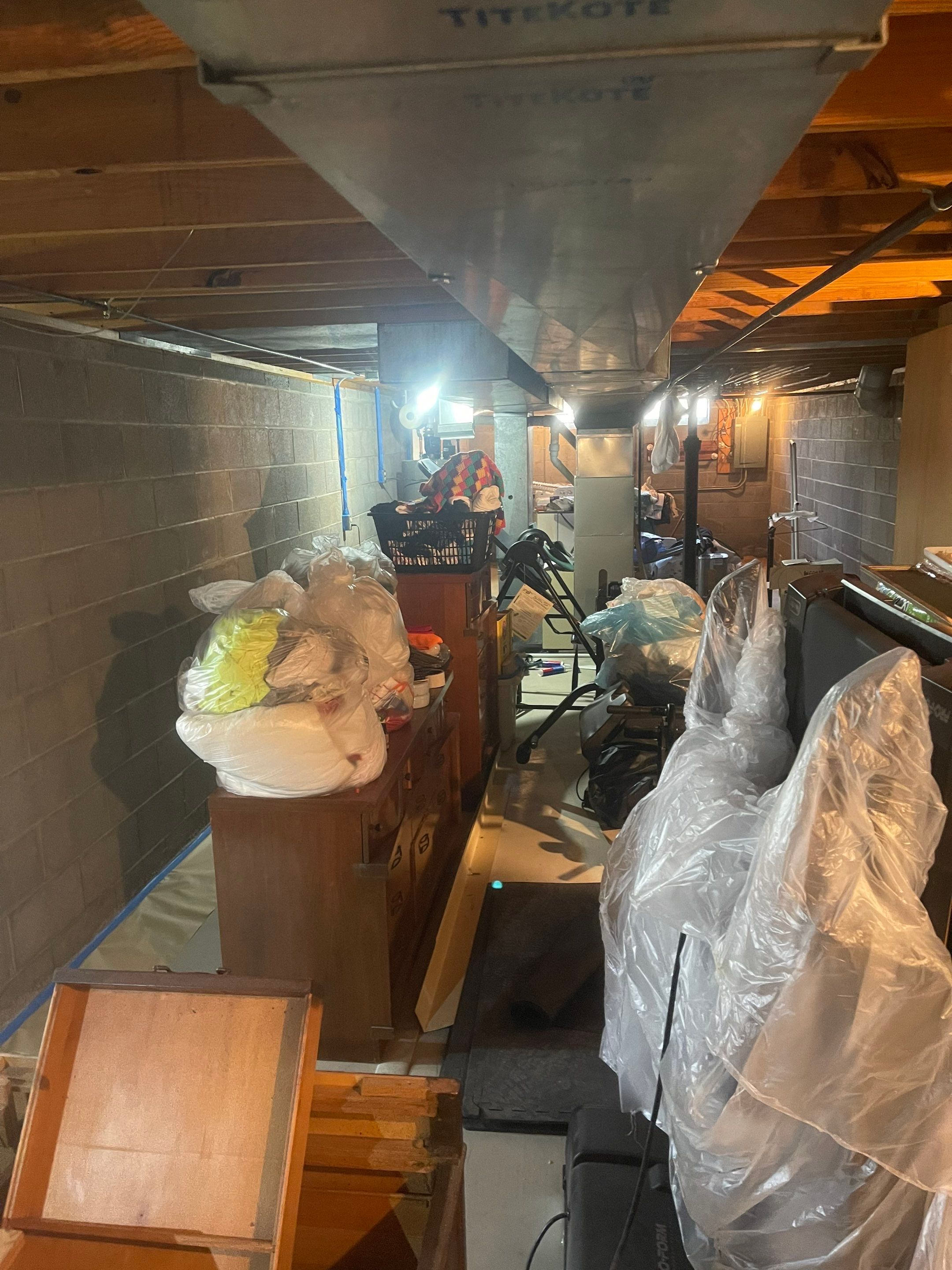 Flooring Installation and Basement Wall Painting using DryLok Extreme by Callaway Contracting LLC