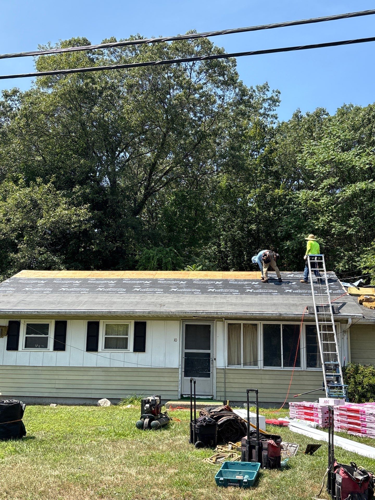 Onyx Black Roof Transformation in Maynard, MA by Mighty Dog Roofing of Greater Middlesex County