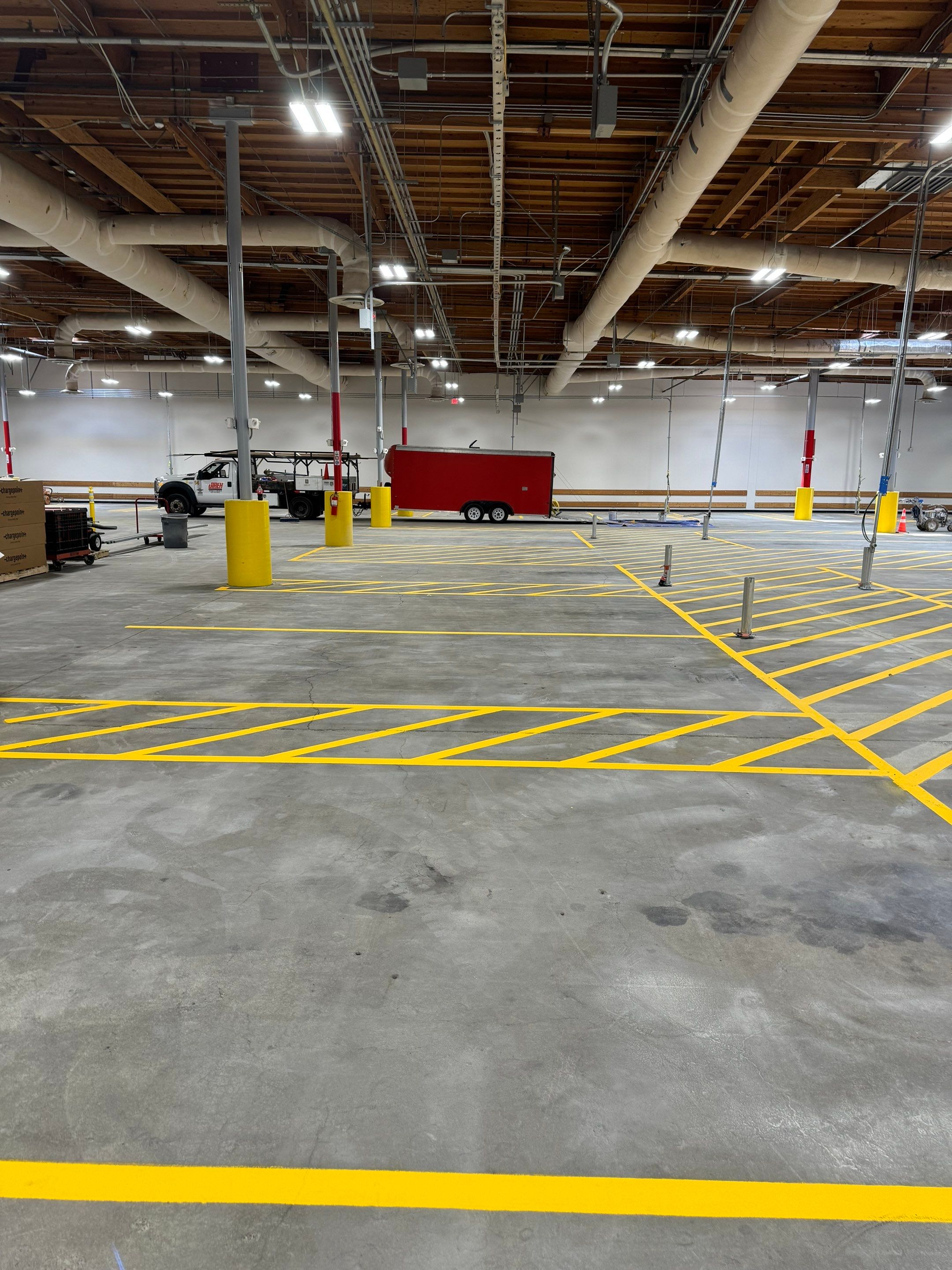 USPS Asphalt Patch Repair, Indoor Parking Lot Sandblast, Outdoor Parking Lot Sealcoating & Indoor/Outdoor Parking Lot Striping  by Jireh Asphalt & Concrete Inc 