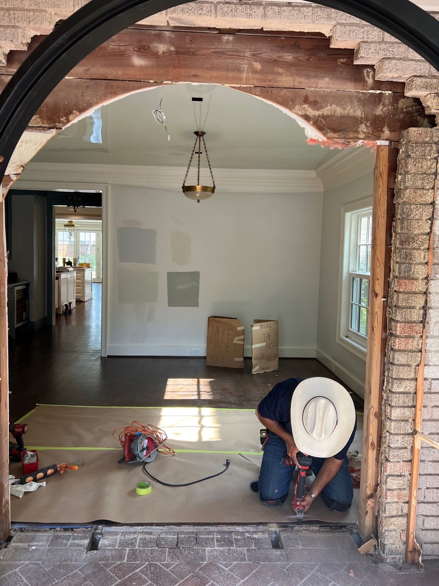 Custom Arched Black Wrought Iron Double Door Installation in Dallas by Solara Custom Living