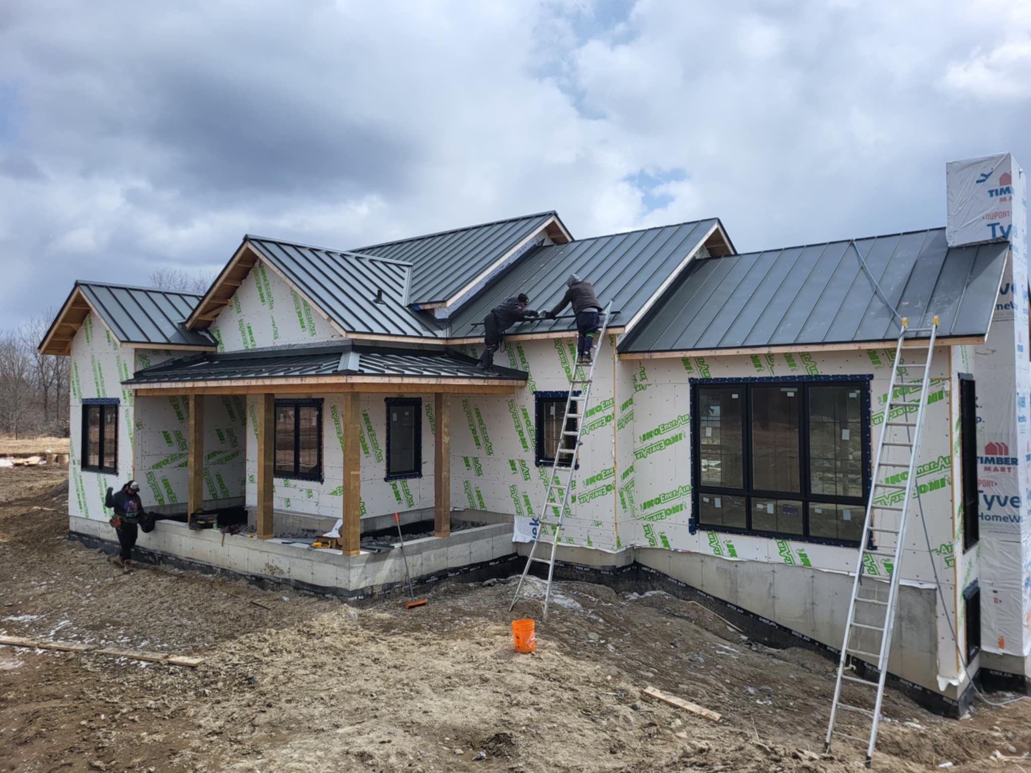 New Home Construction using 16" Standing Seam Panels by Jay Carter Roofing & Sheet Metal